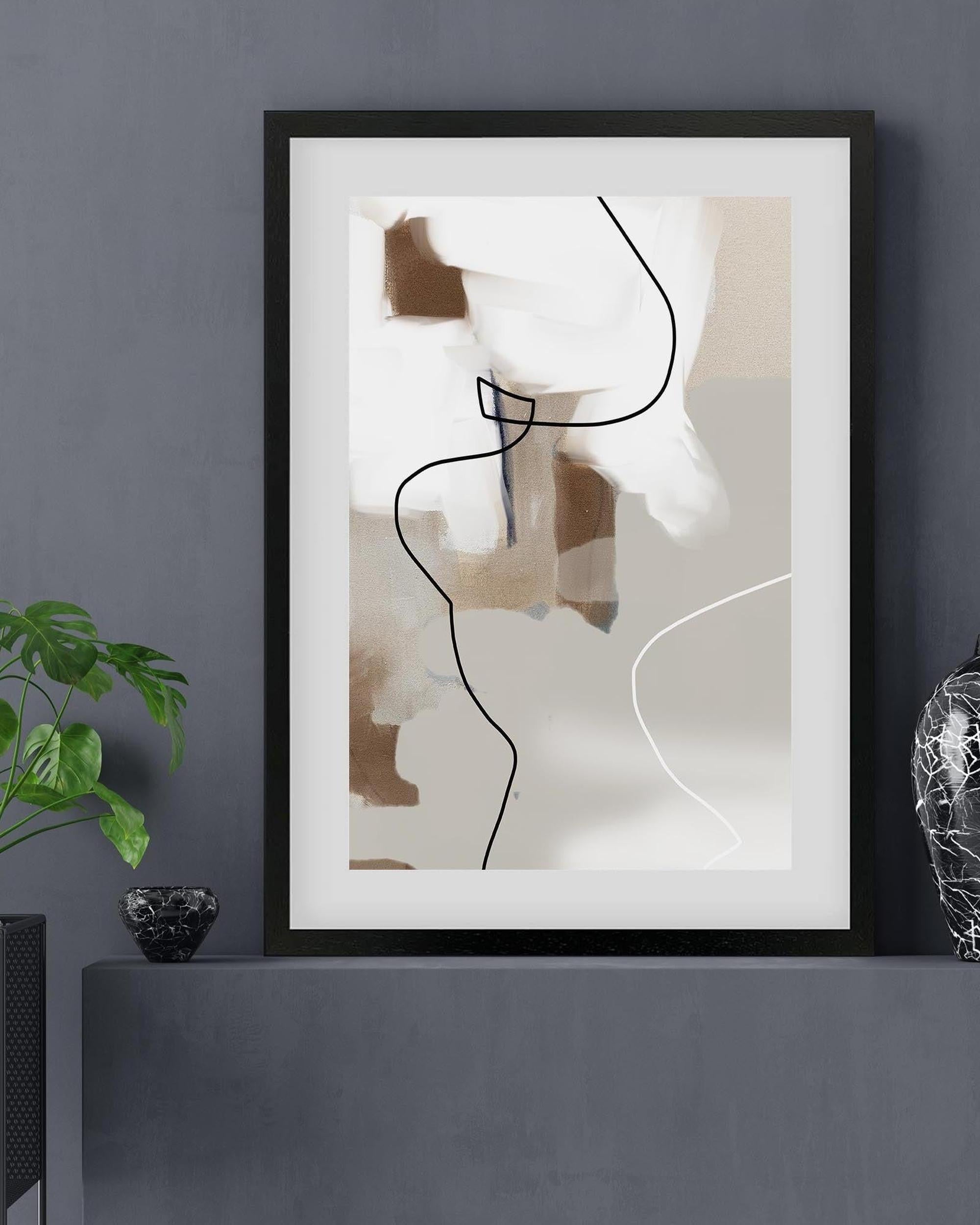 Framed abstract art piece on a gray wall with a plant and decorative object.