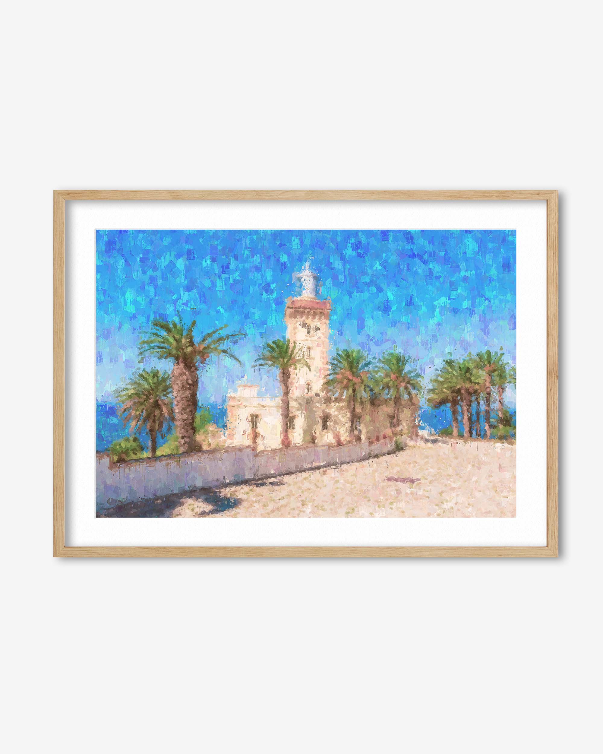 Framed artwork of a coastal scene with a lighthouse and palm trees.