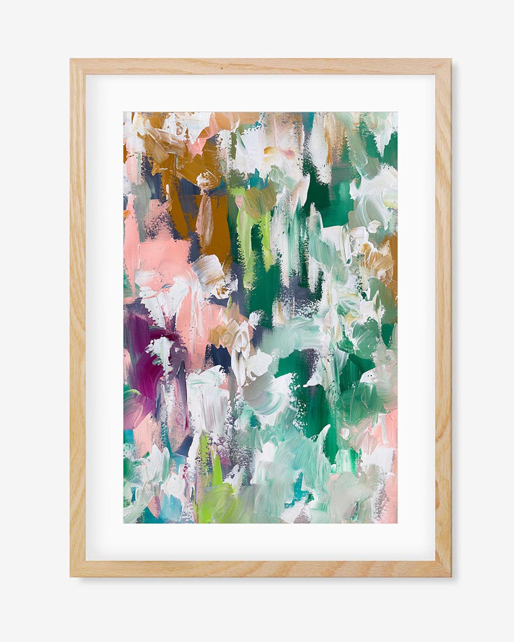 A framed art piece with an abstract design featuring vibrant colors, with hints of white, green, pink, and orange, in a naturalistic floral style.