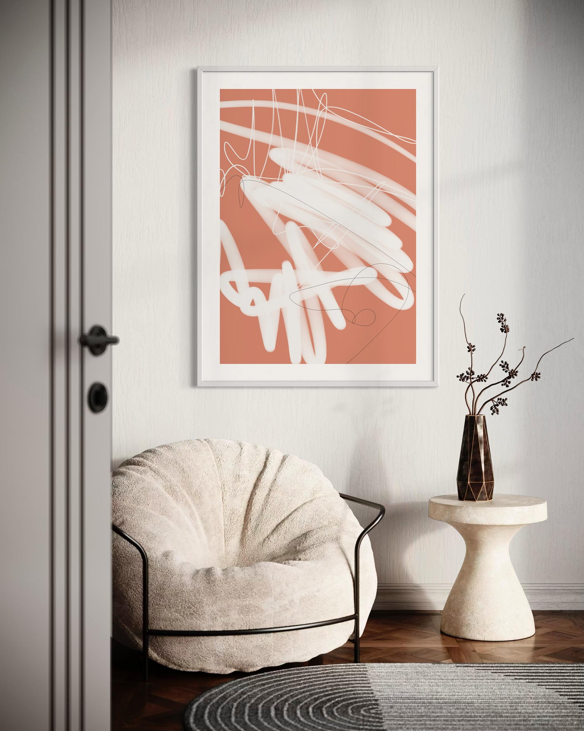 Modern interior with abstract art, chair, and side table.