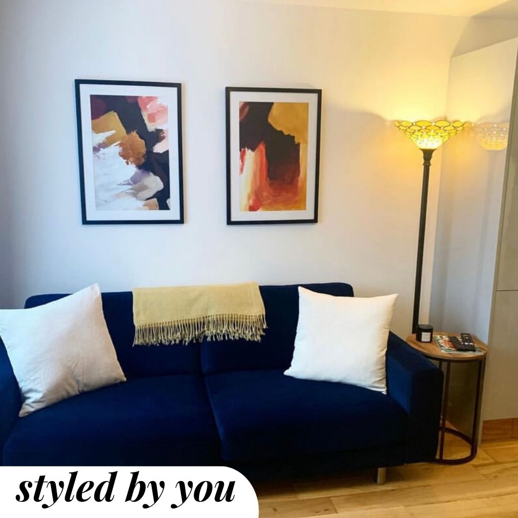 Framed print above a sofa