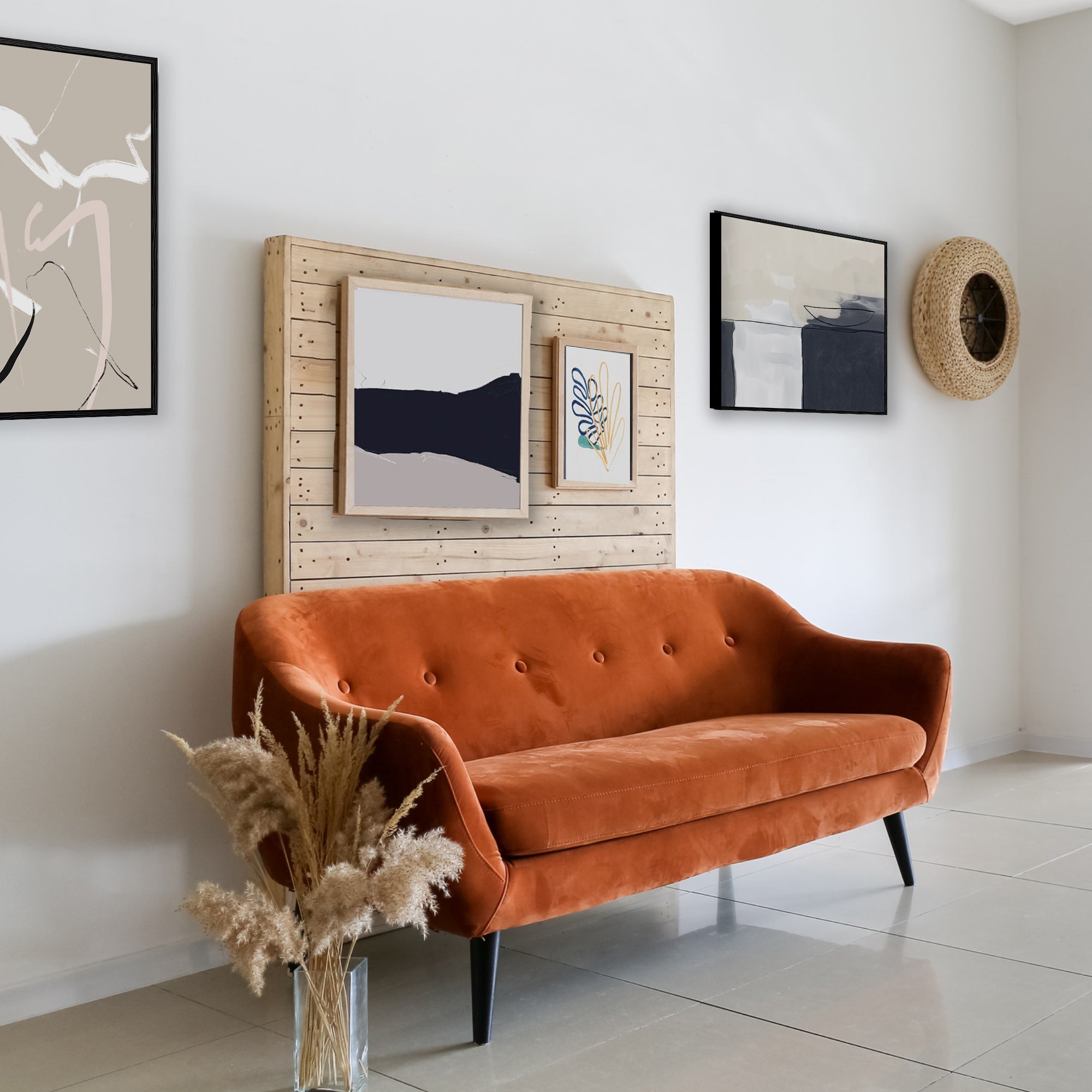 square abstract pictures above modern sofa