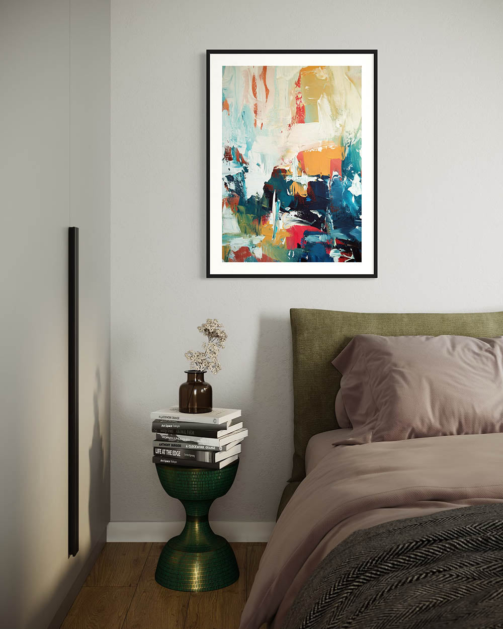 abstract wall art print framed on a wall above bed