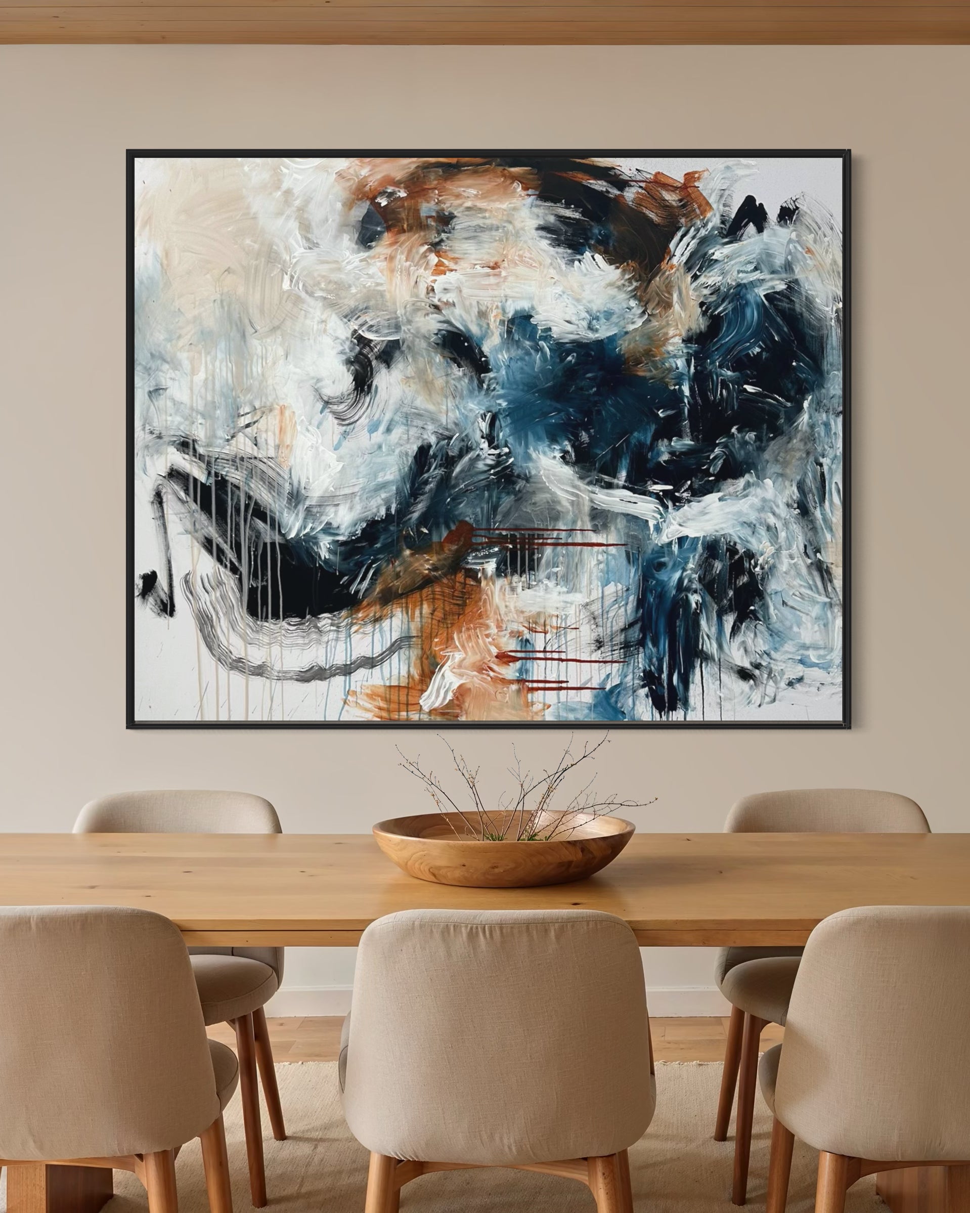 extra large painting on a wall in a modern dining room