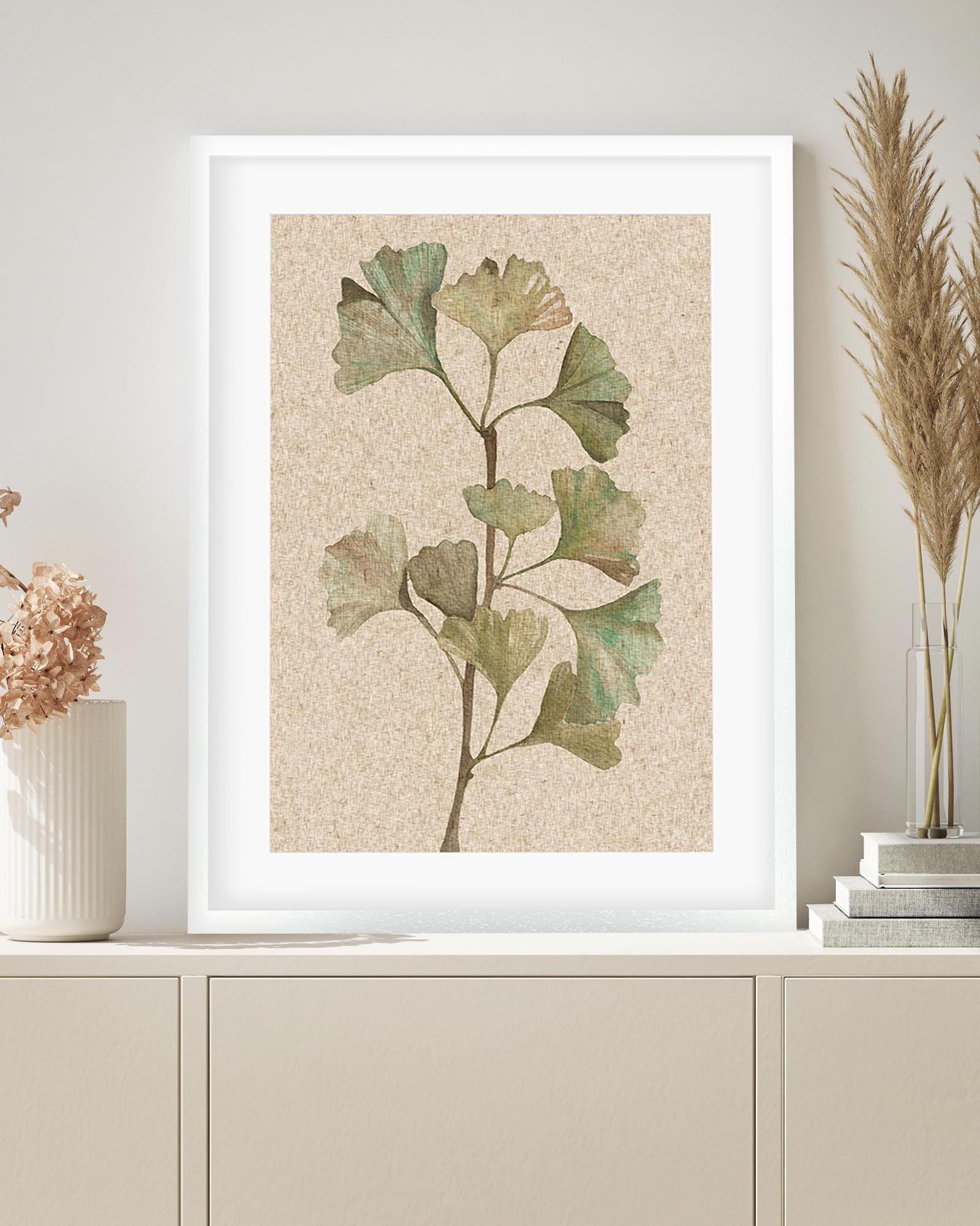 Framed botanical print of ginkgo leaves on a neutral background