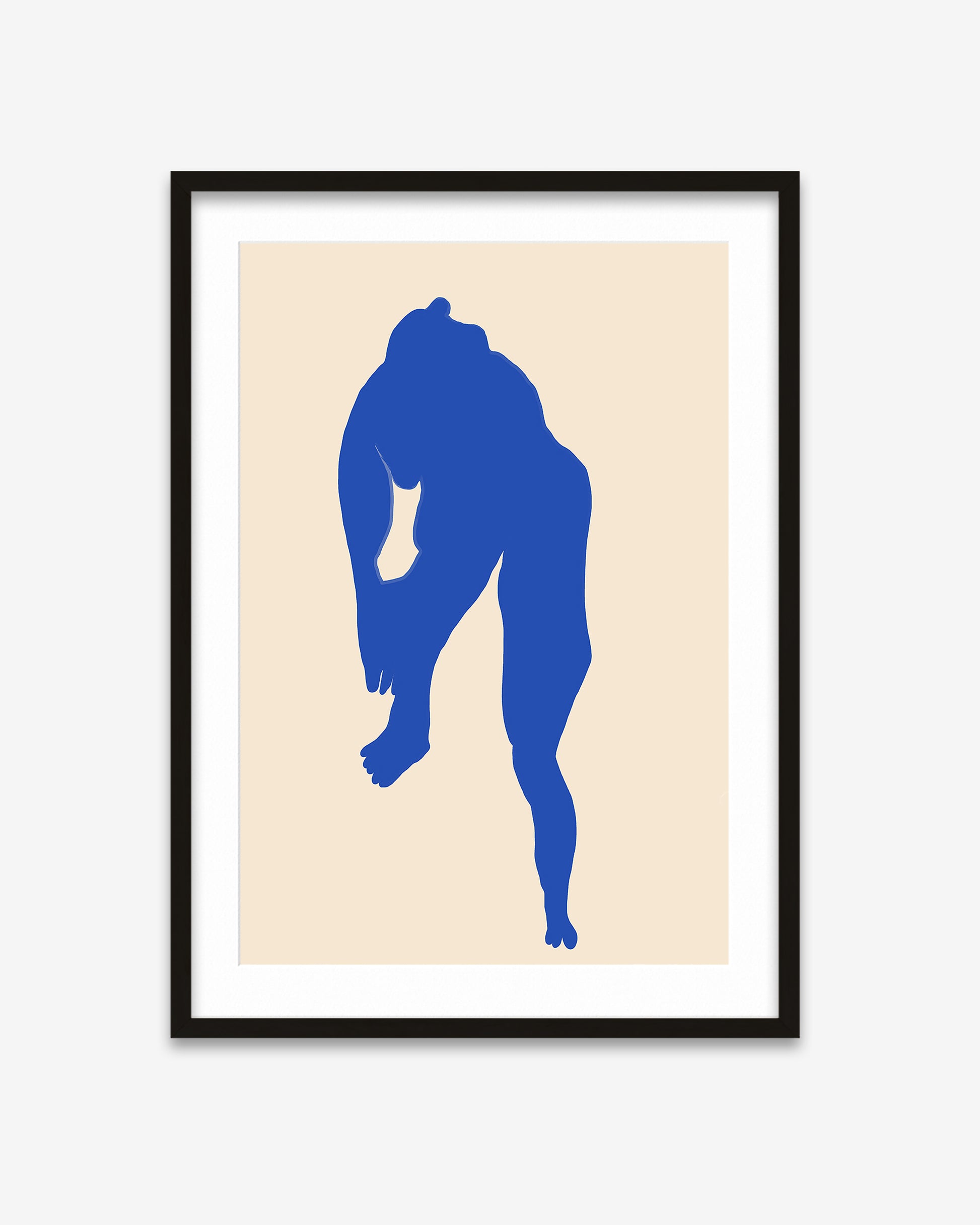 Framed artwork of a blue silhouette of a dog on a beige background