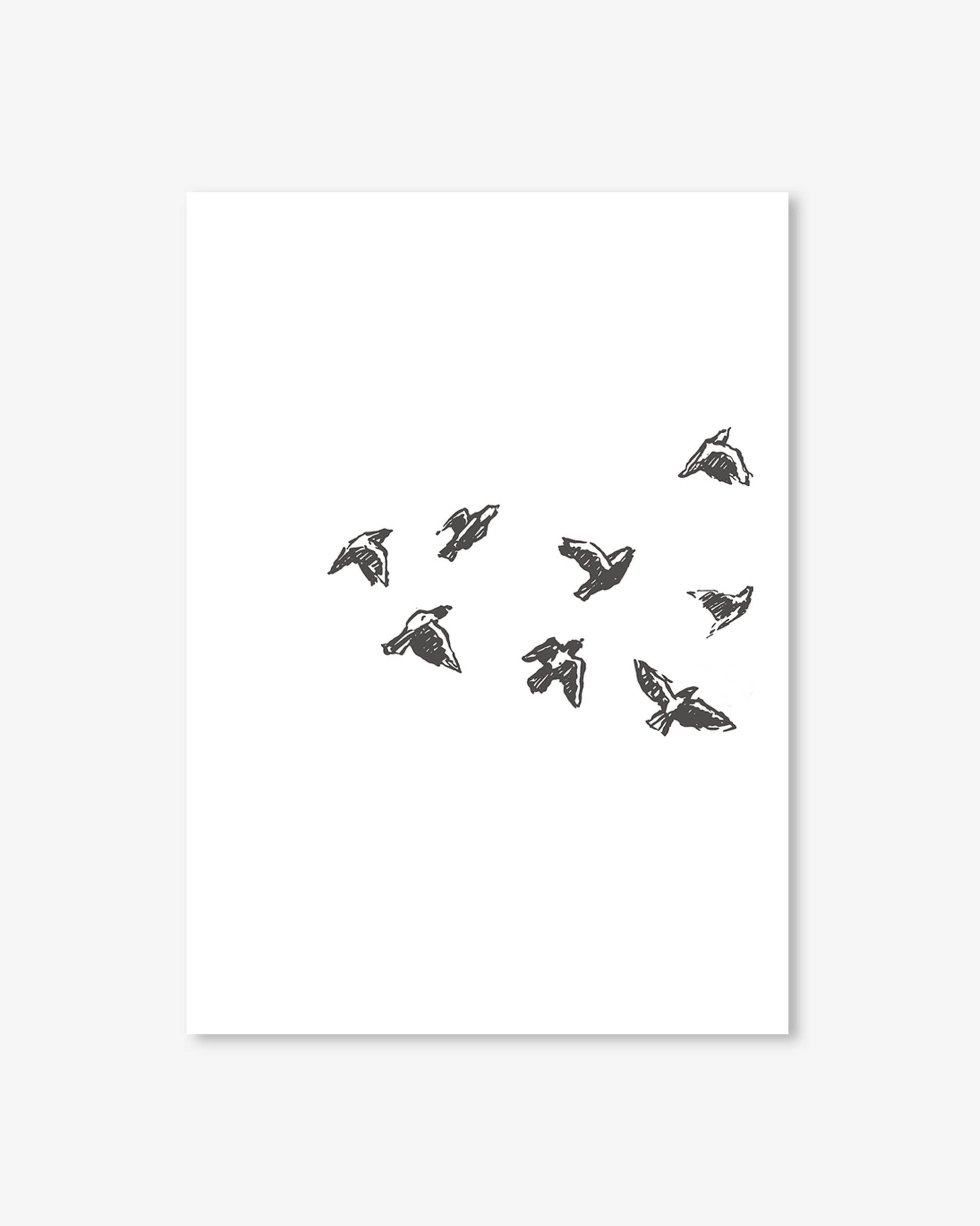 Framed artwork with black and white bird illustrations on a white background