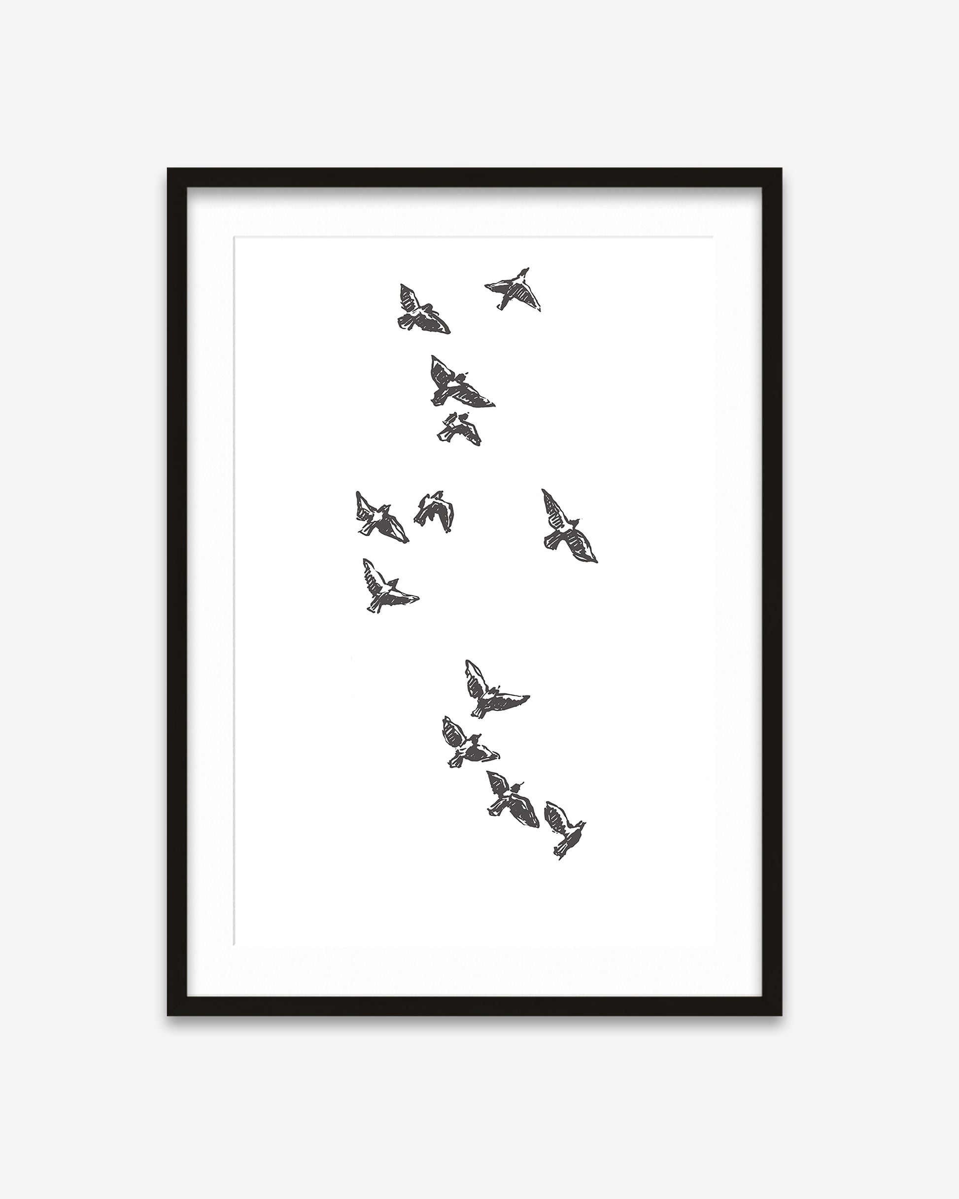 Framed artwork with black and white butterfly illustrations on a white background