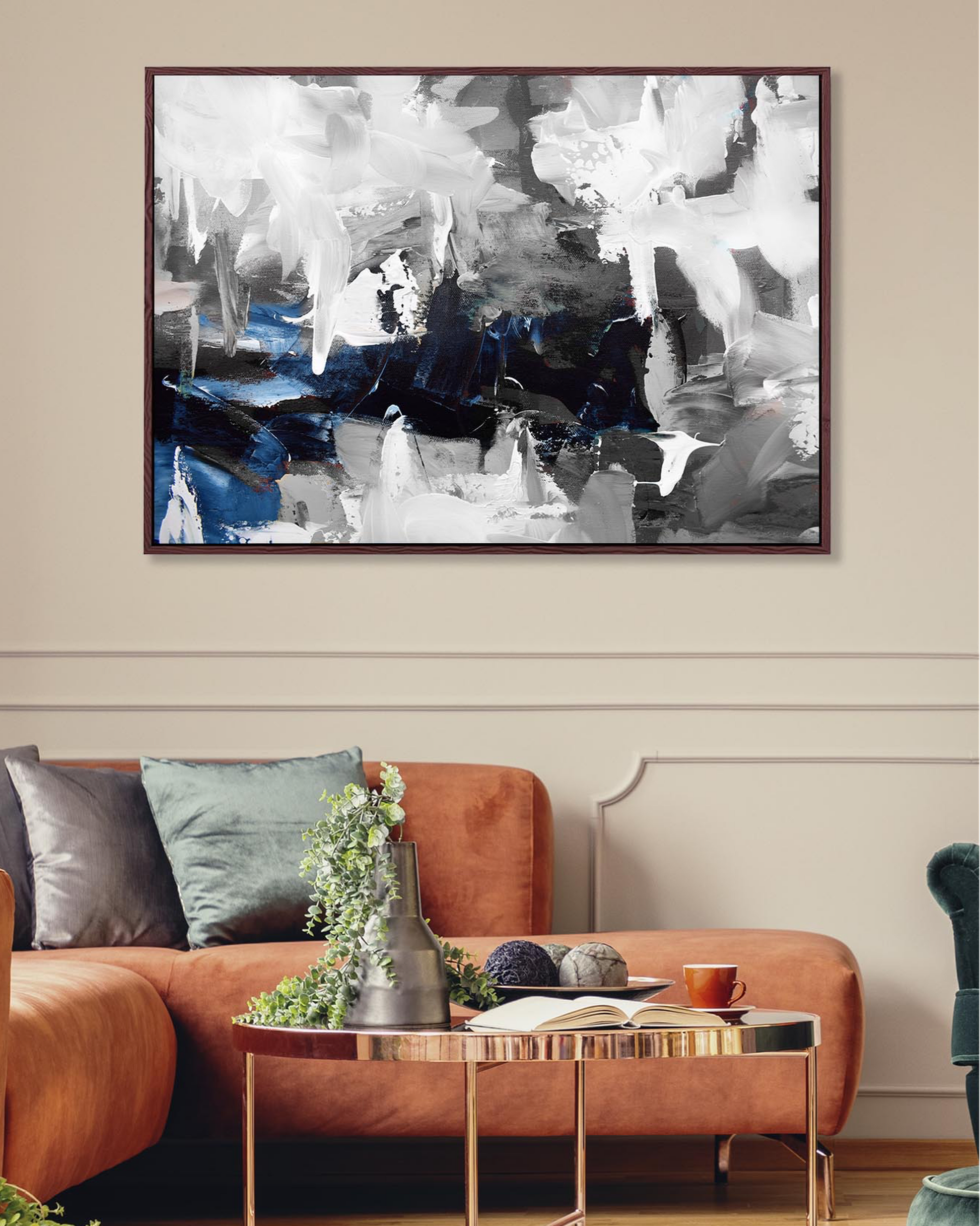 An extra large abstract canvas painting featuring shades of blue and gray, displayed above a living room sofa with a choice of frame colors including black, white, or natural wood pine.