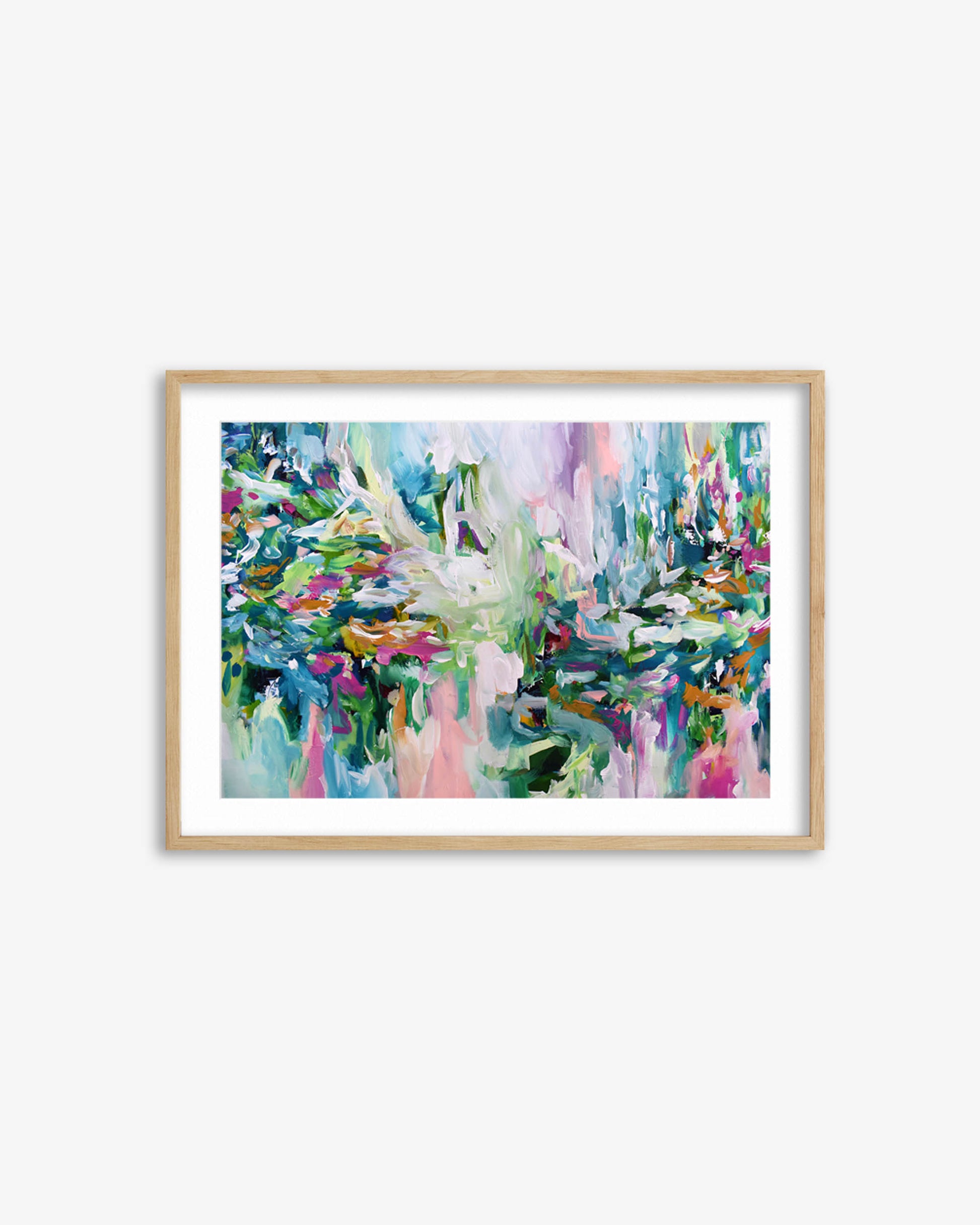 Framed abstract painting with colorful brushstrokes on a white wall