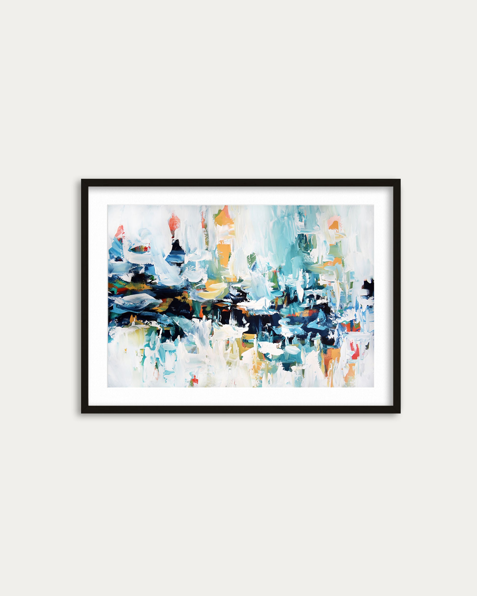 Framed abstract art print on a white wall