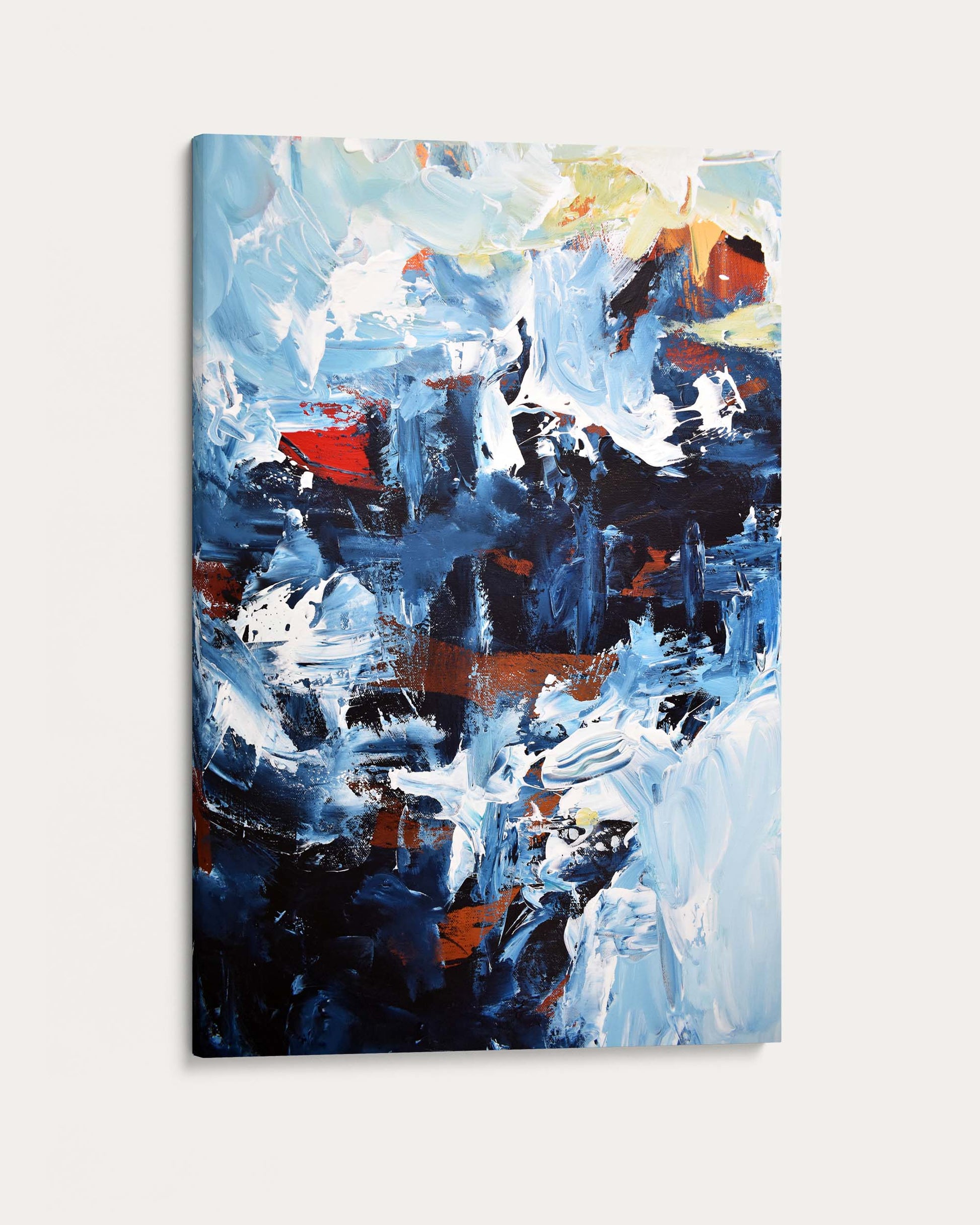 Abstract painting with a mix of blue, red, and white on a light gray background