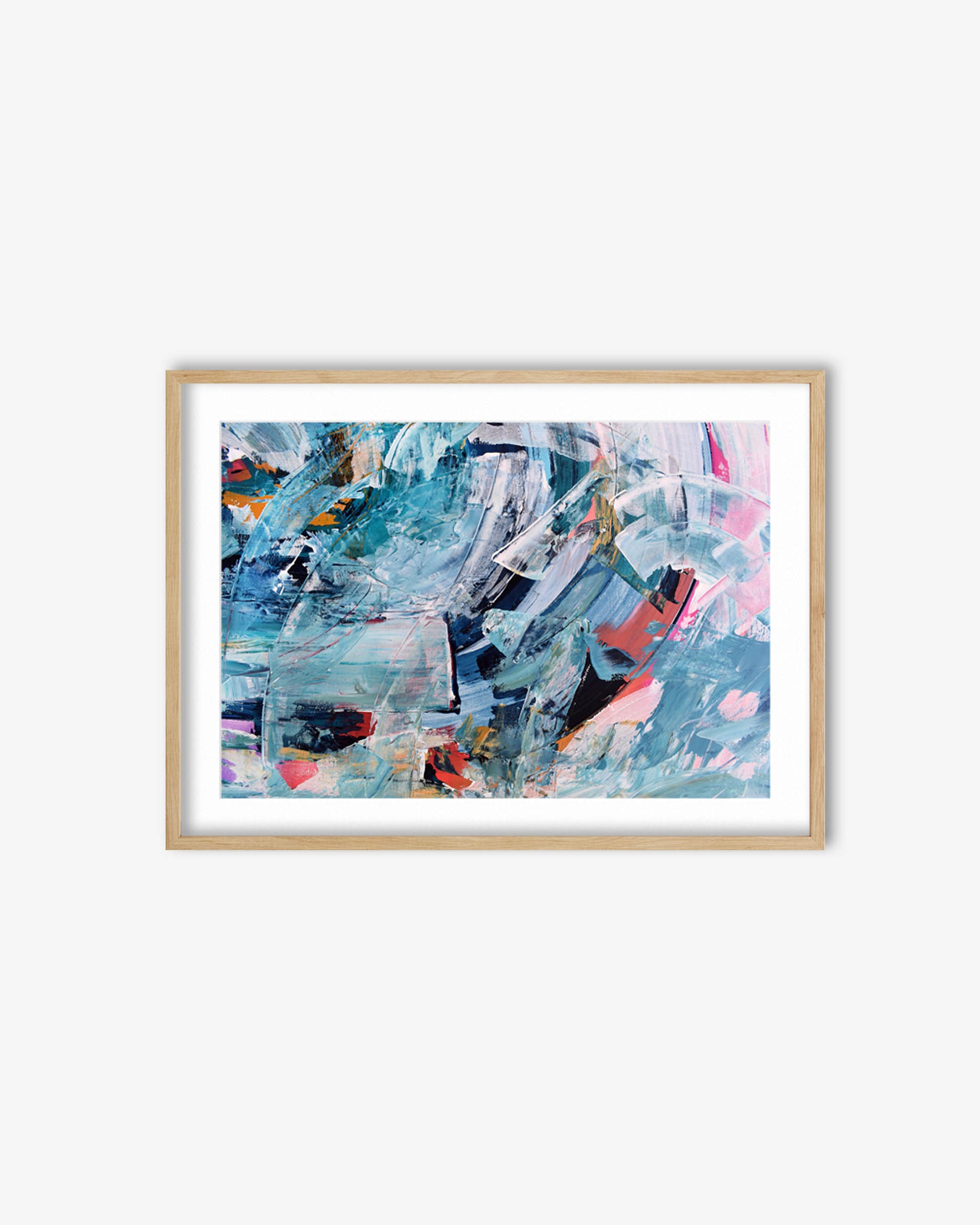 Framed abstract art print with colorful brush strokes on a white wall