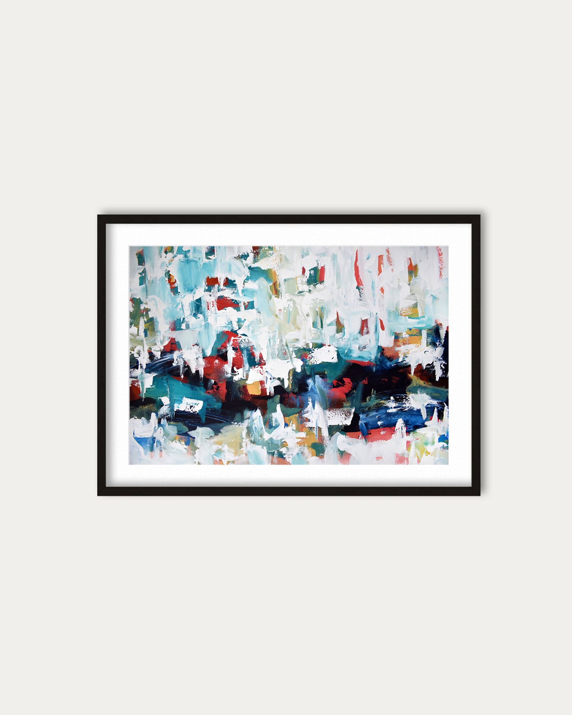 Framed abstract art print on a white wall