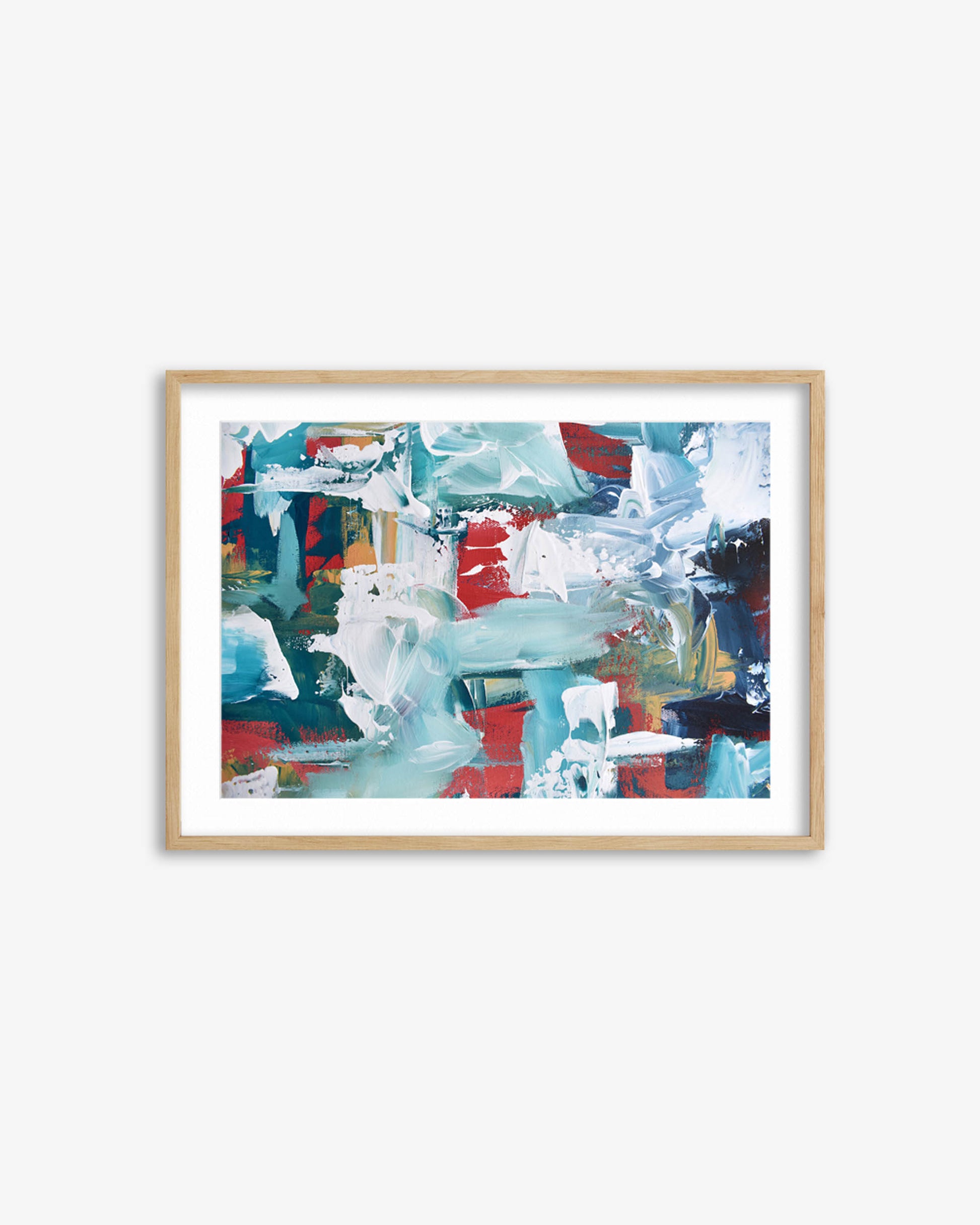 Framed abstract art print with colorful abstract design on a white wall