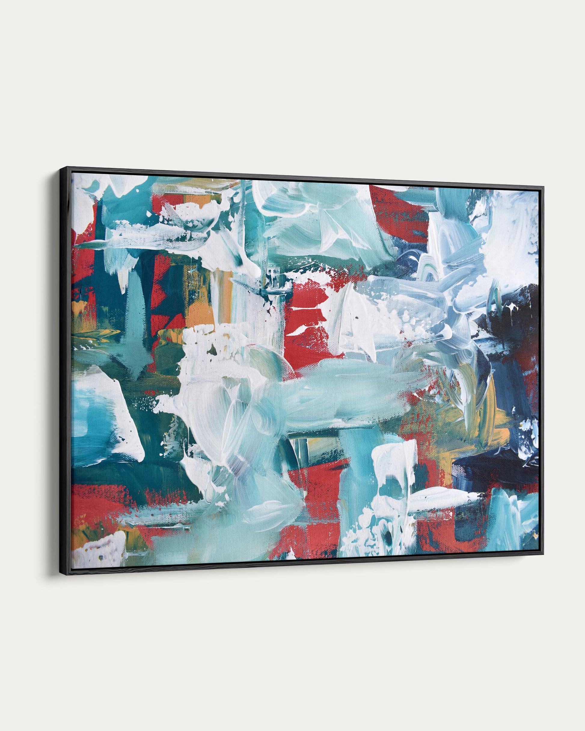 Abstract painting with a black frame on a white wall
