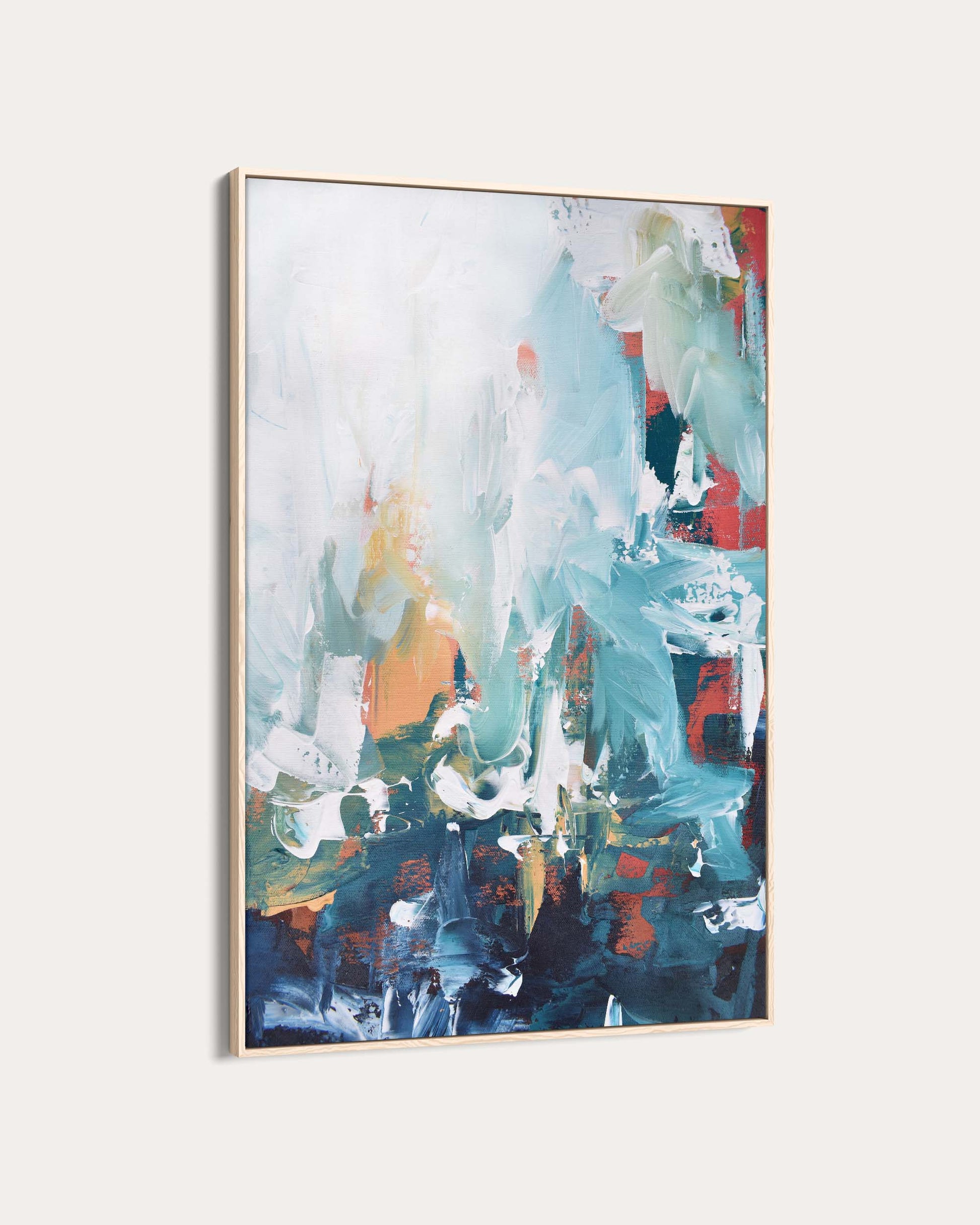 Abstract painting with colorful brush strokes in a gold frame on a white background