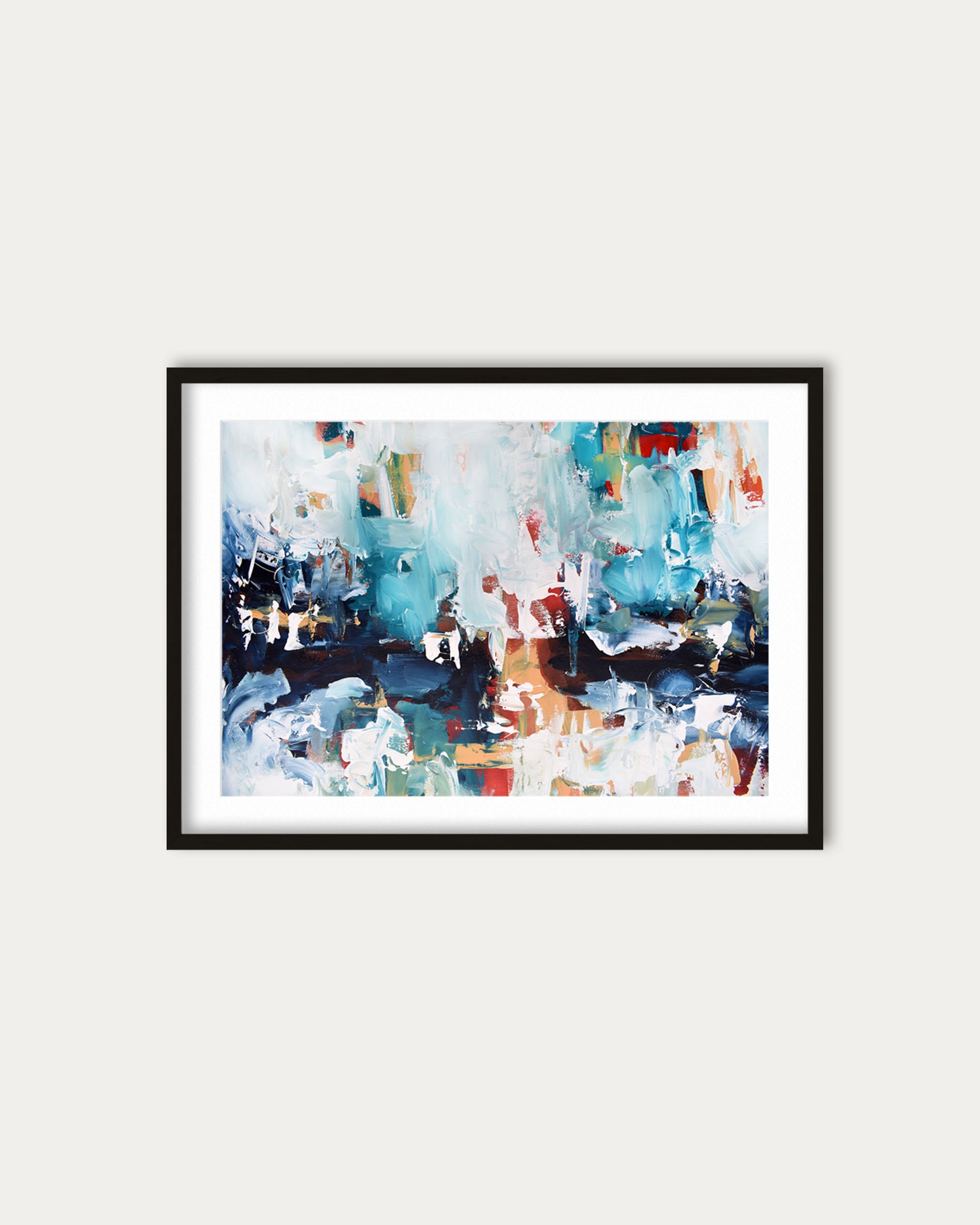 Framed abstract art print with colorful brush strokes on a white wall