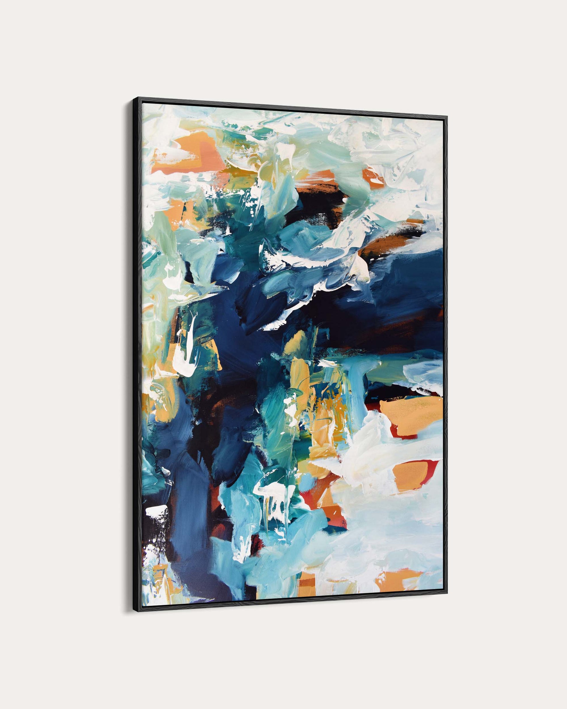 Abstract painting with blue, orange, and white colors in a black frame on a light gray background