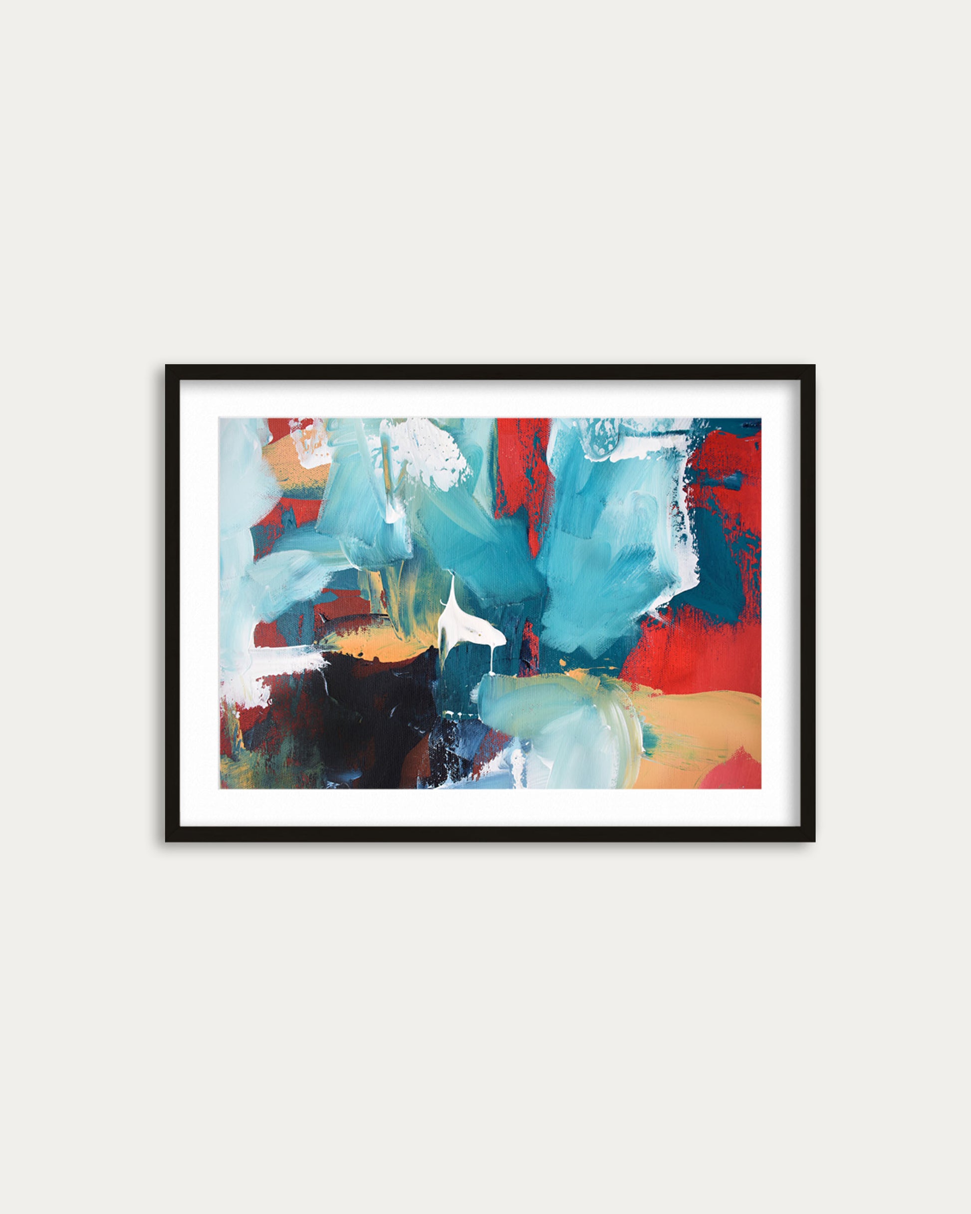 Framed abstract painting with colorful brush strokes on a white wall