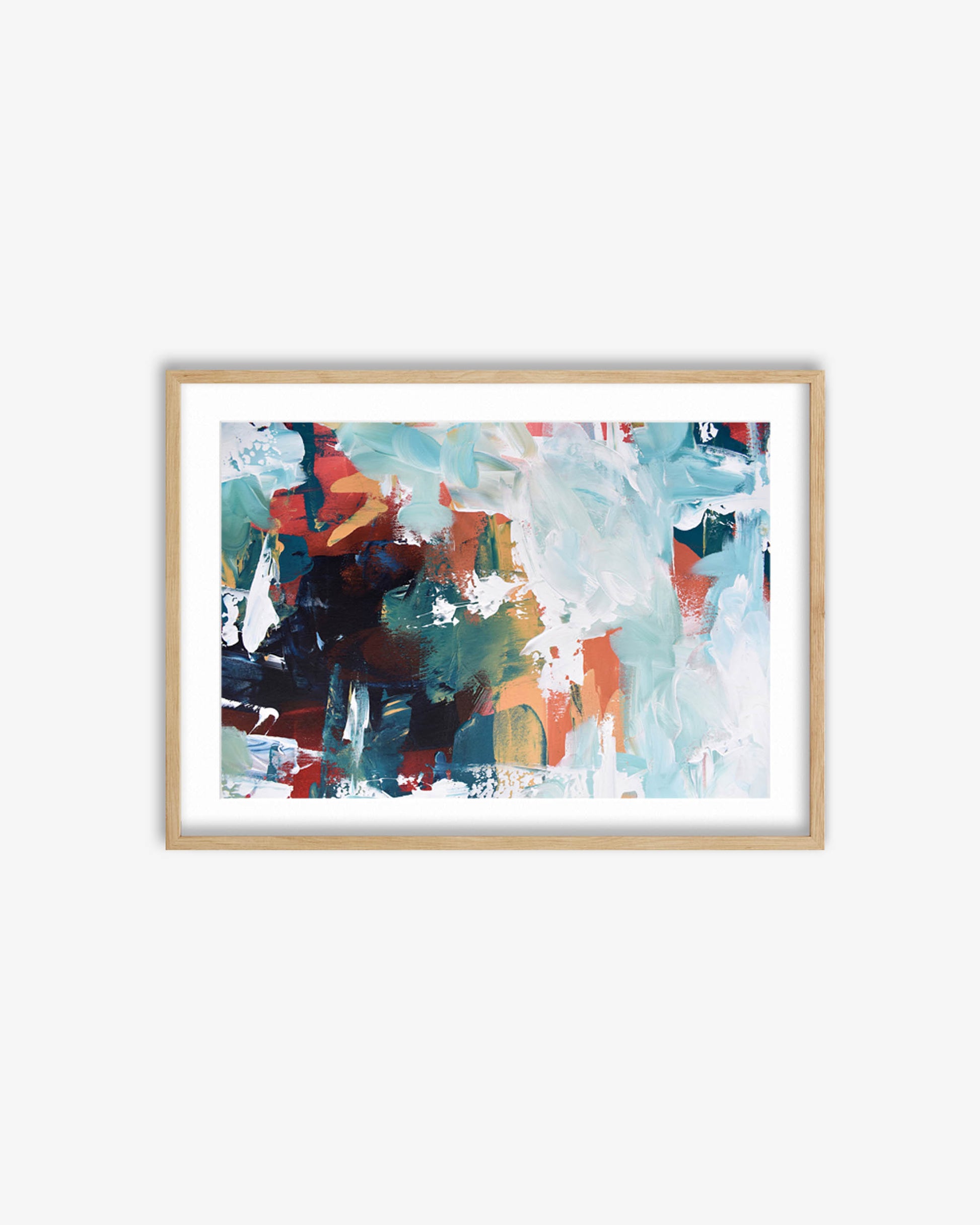 Framed abstract art print with colorful brush strokes on a white wall