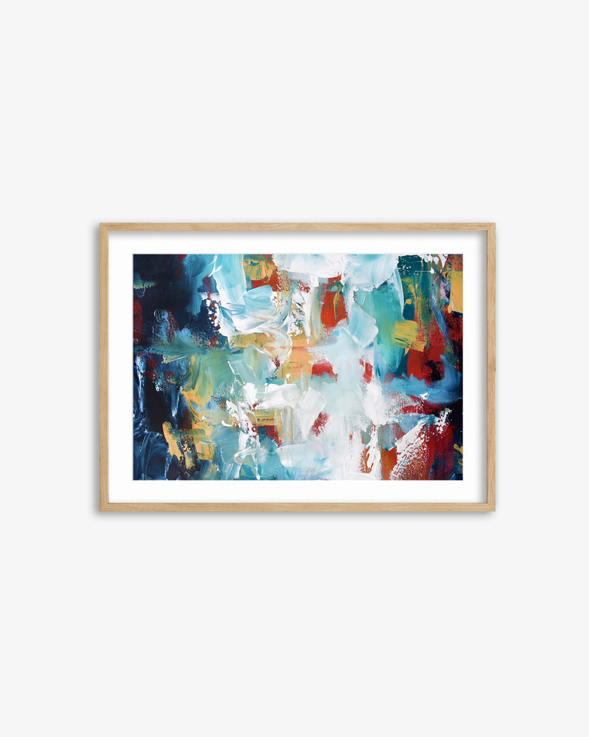 Framed abstract art print with colorful brush strokes on a white wall