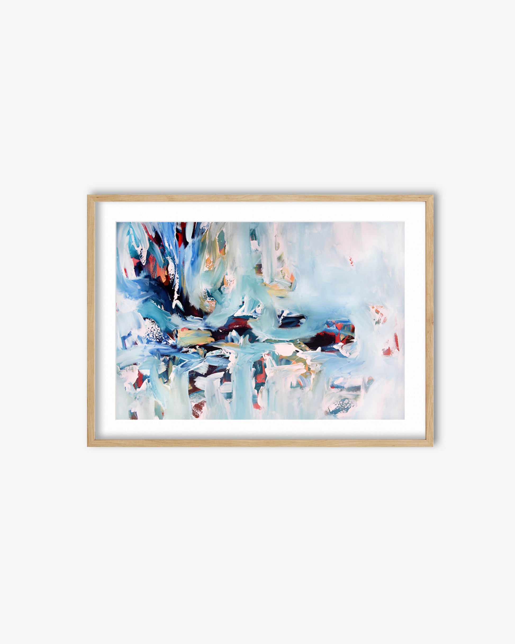 Framed abstract artwork with a colorful design on a white wall