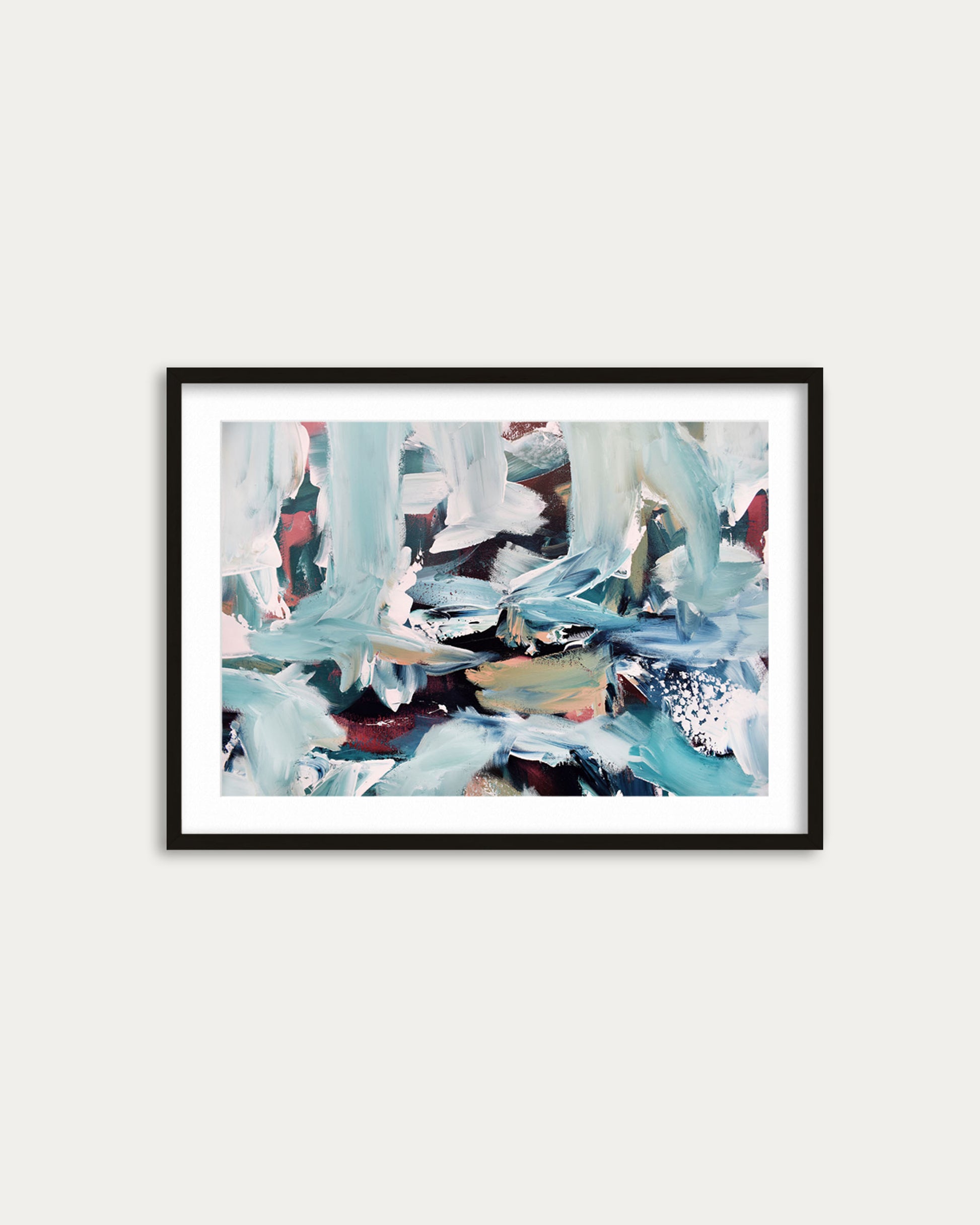 Framed abstract art print on a white wall