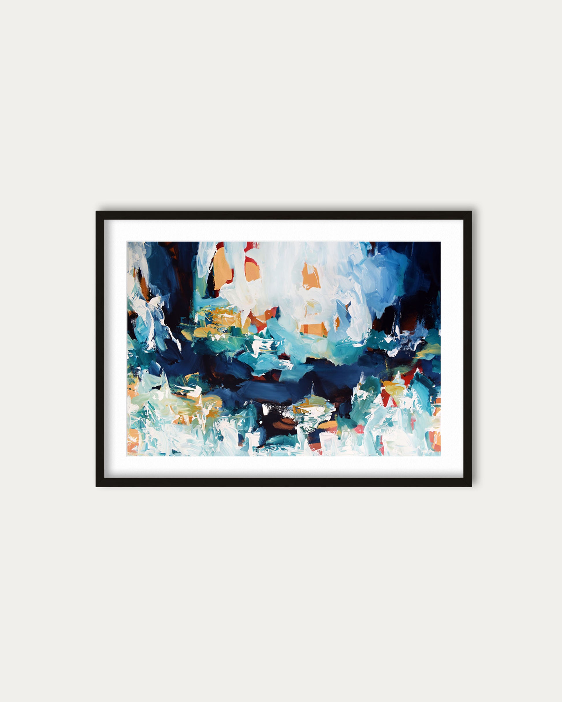 Framed abstract art print on a white wall