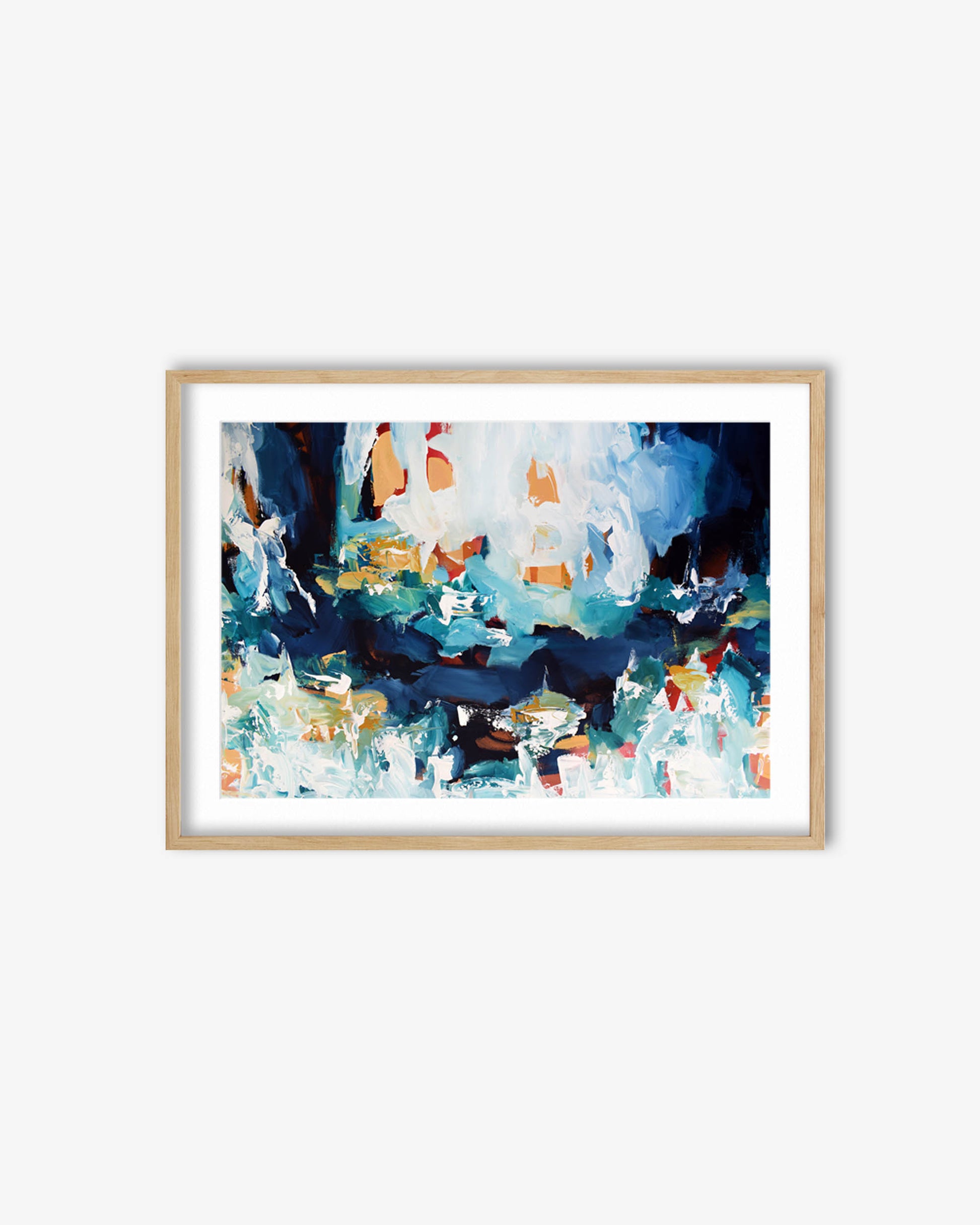 Framed abstract art print with blue and multicolor design on a white wall