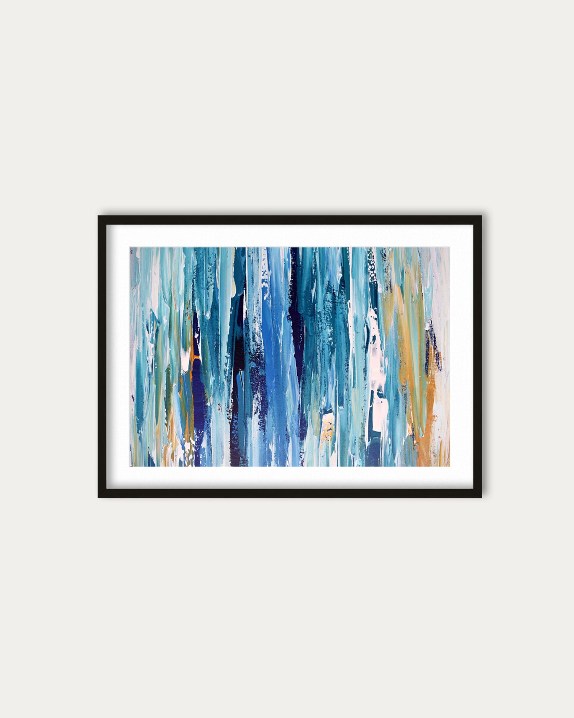 Framed abstract art print with blue and purple brushstrokes on a white wall