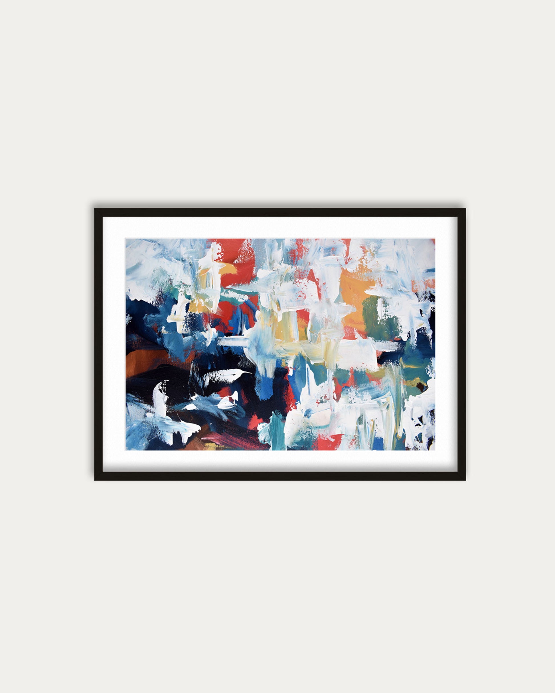 Framed abstract painting with colorful brush strokes on a white wall
