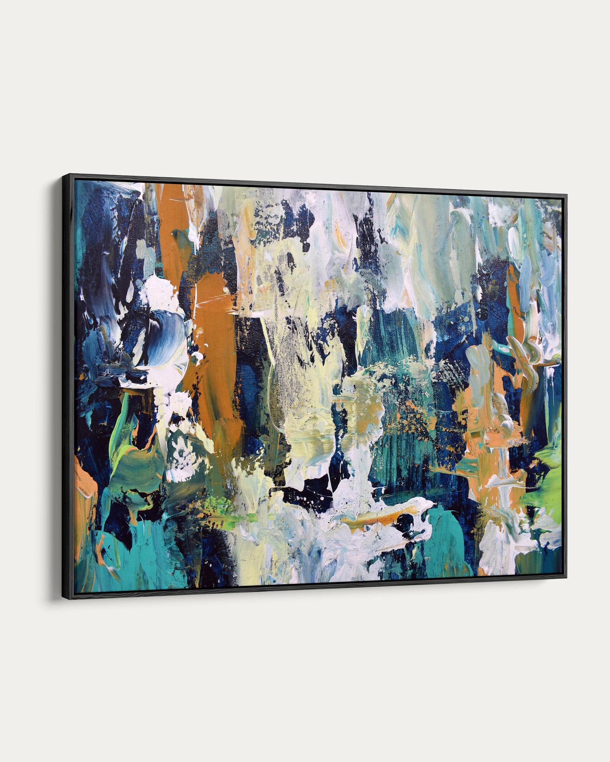 Abstract painting with blue, green, and orange colors on a white wall
