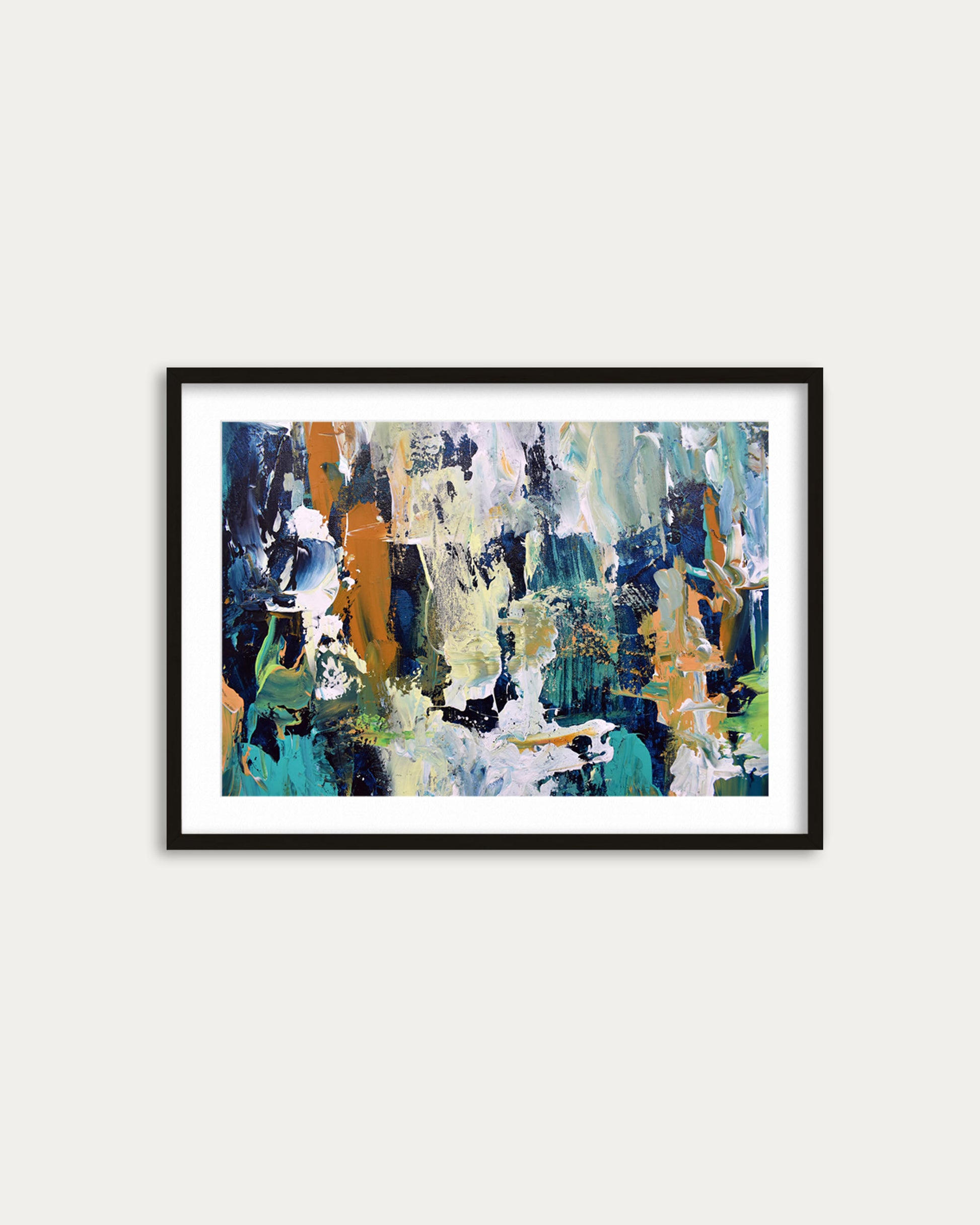 Framed abstract art print on a white wall