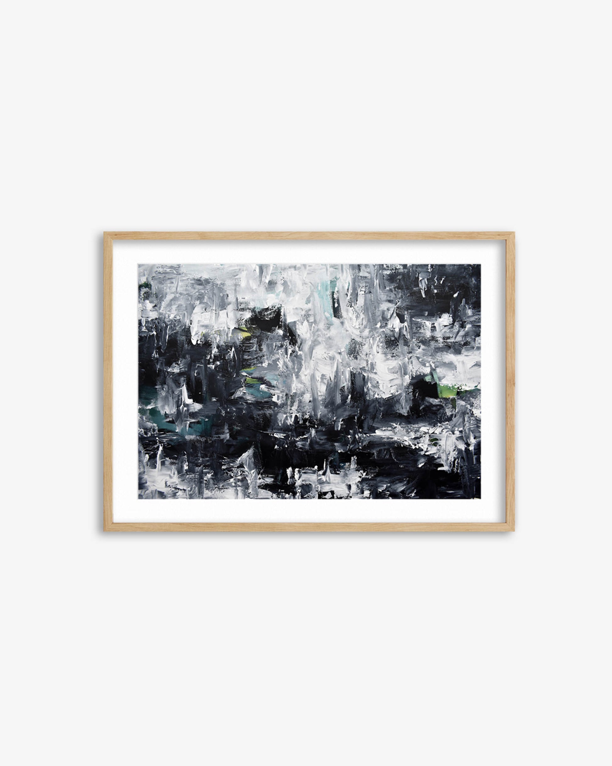 Framed abstract art print on a white wall