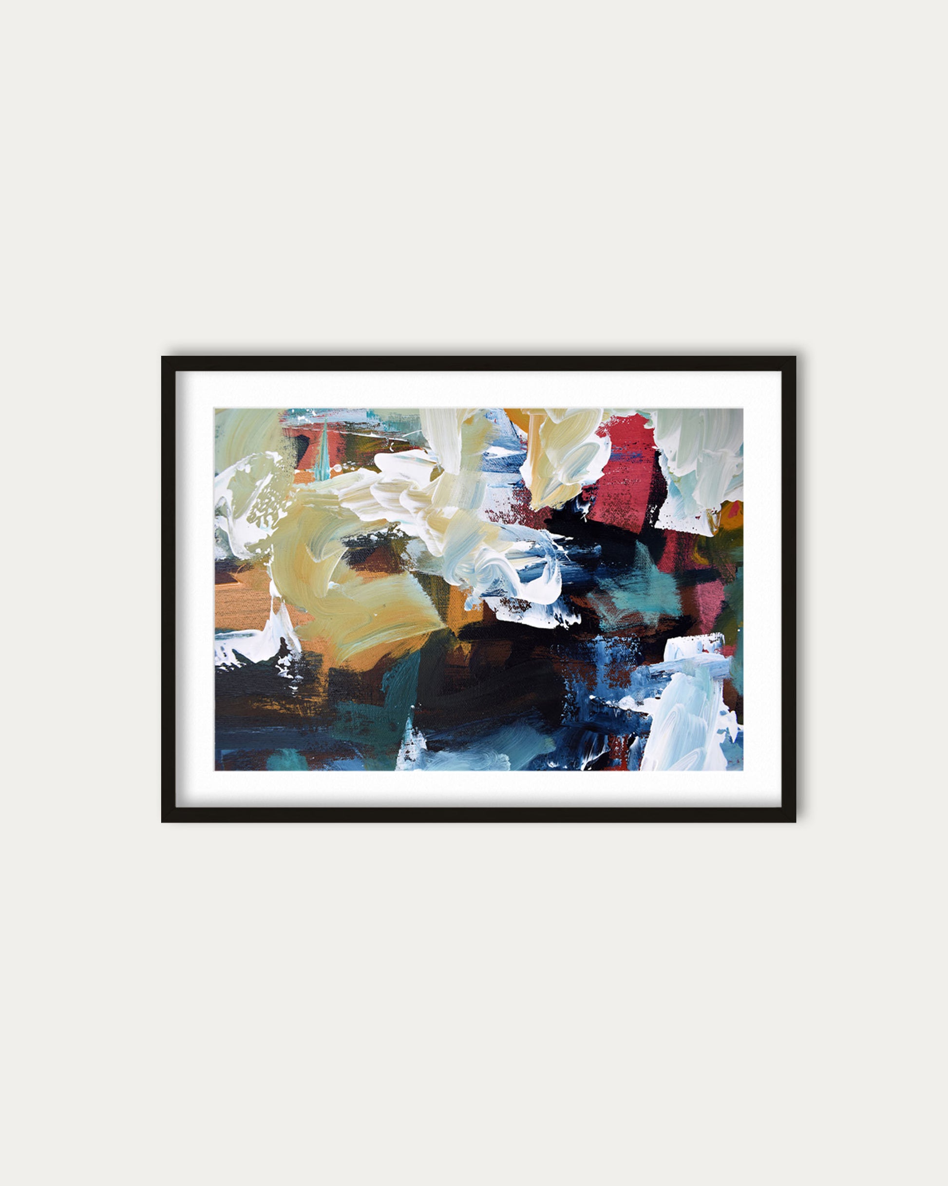 Framed abstract art print on a white wall