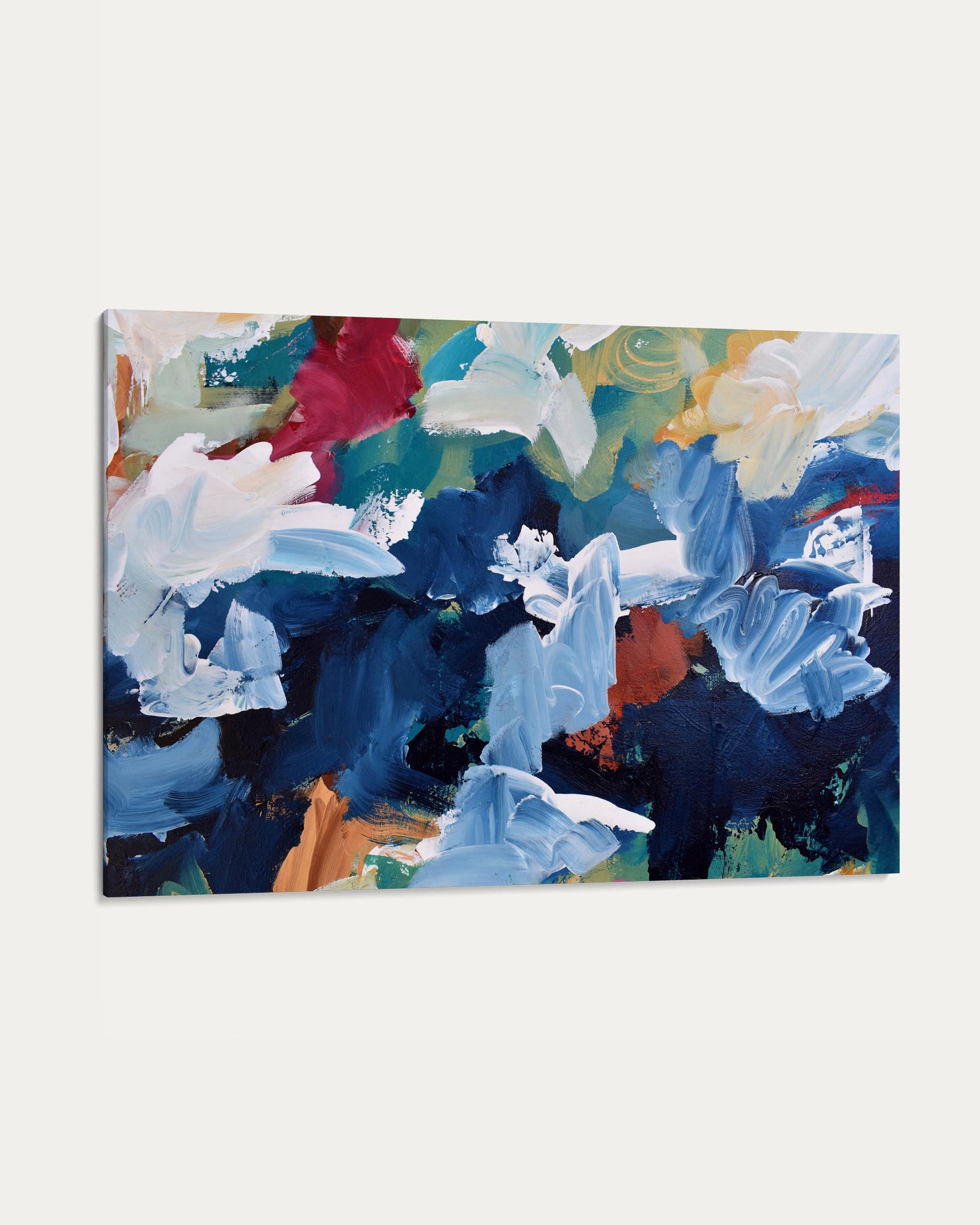Abstract painting with blue, white, and multicolor flowers on a white background