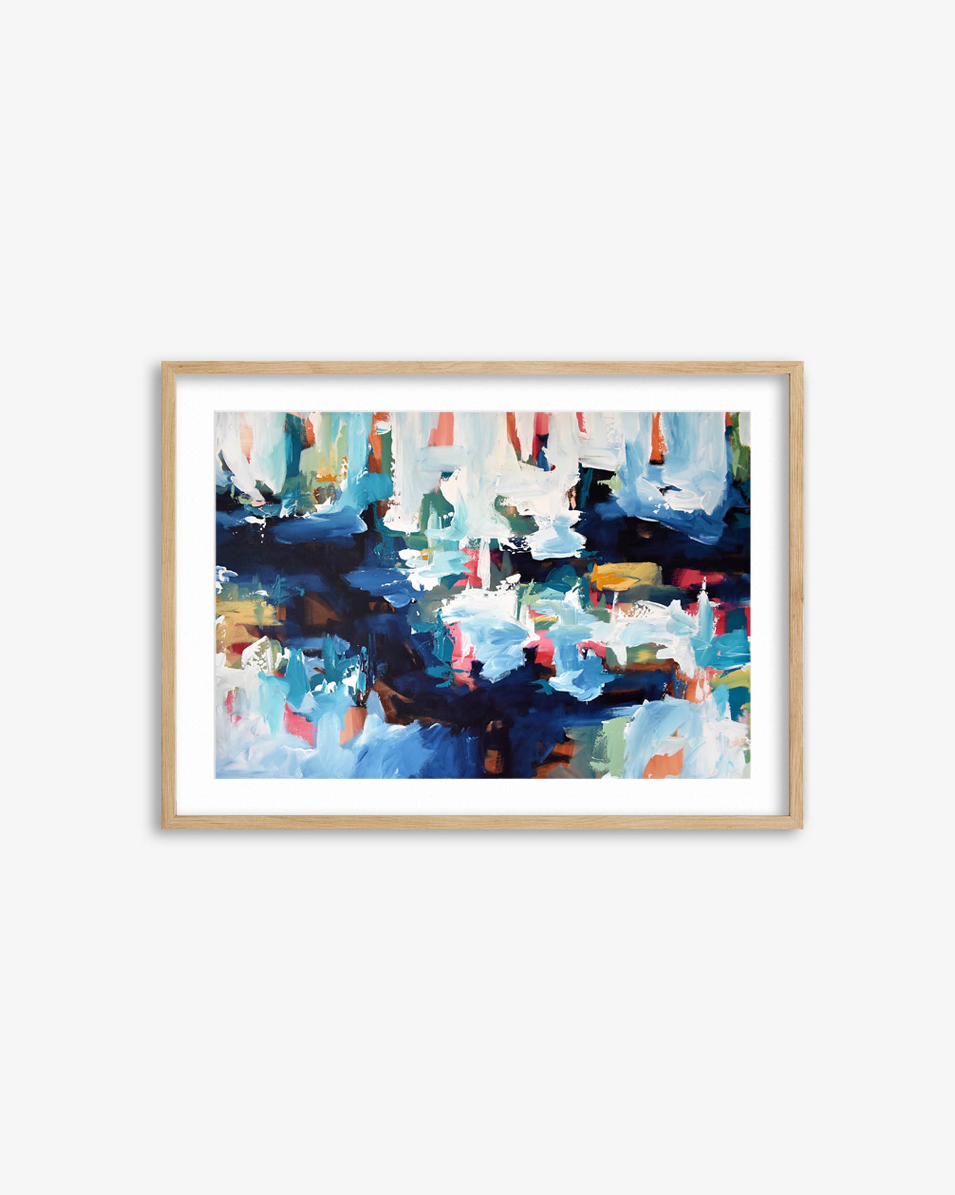 Framed abstract painting with colorful brush strokes on a white wall