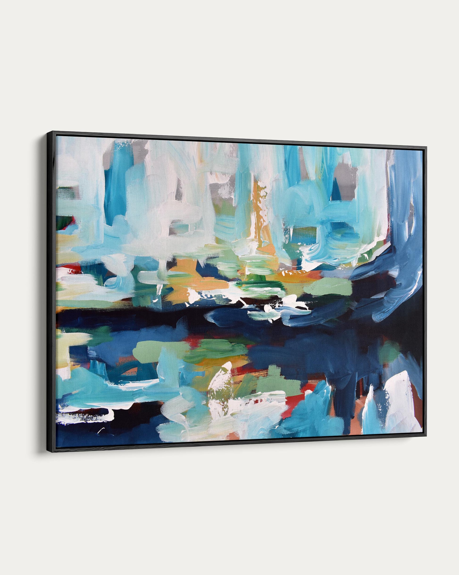 Abstract painting with vibrant colors in a black frame on a white background