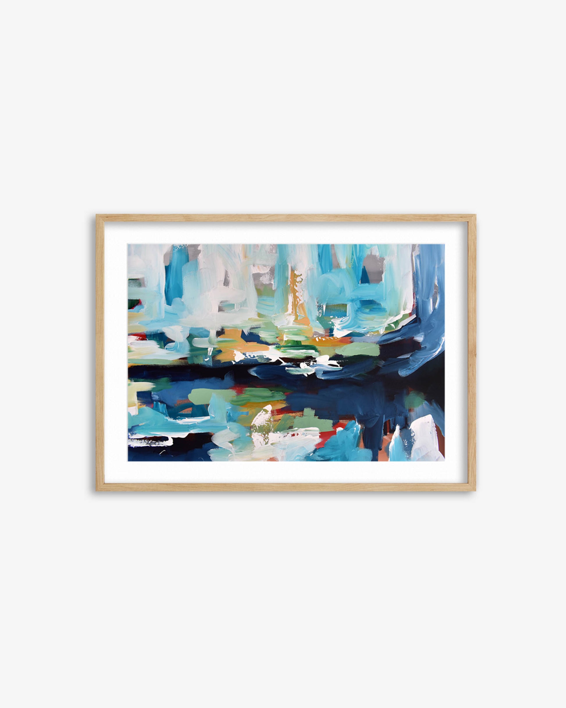 Framed abstract art print with blue and green colors on a white wall