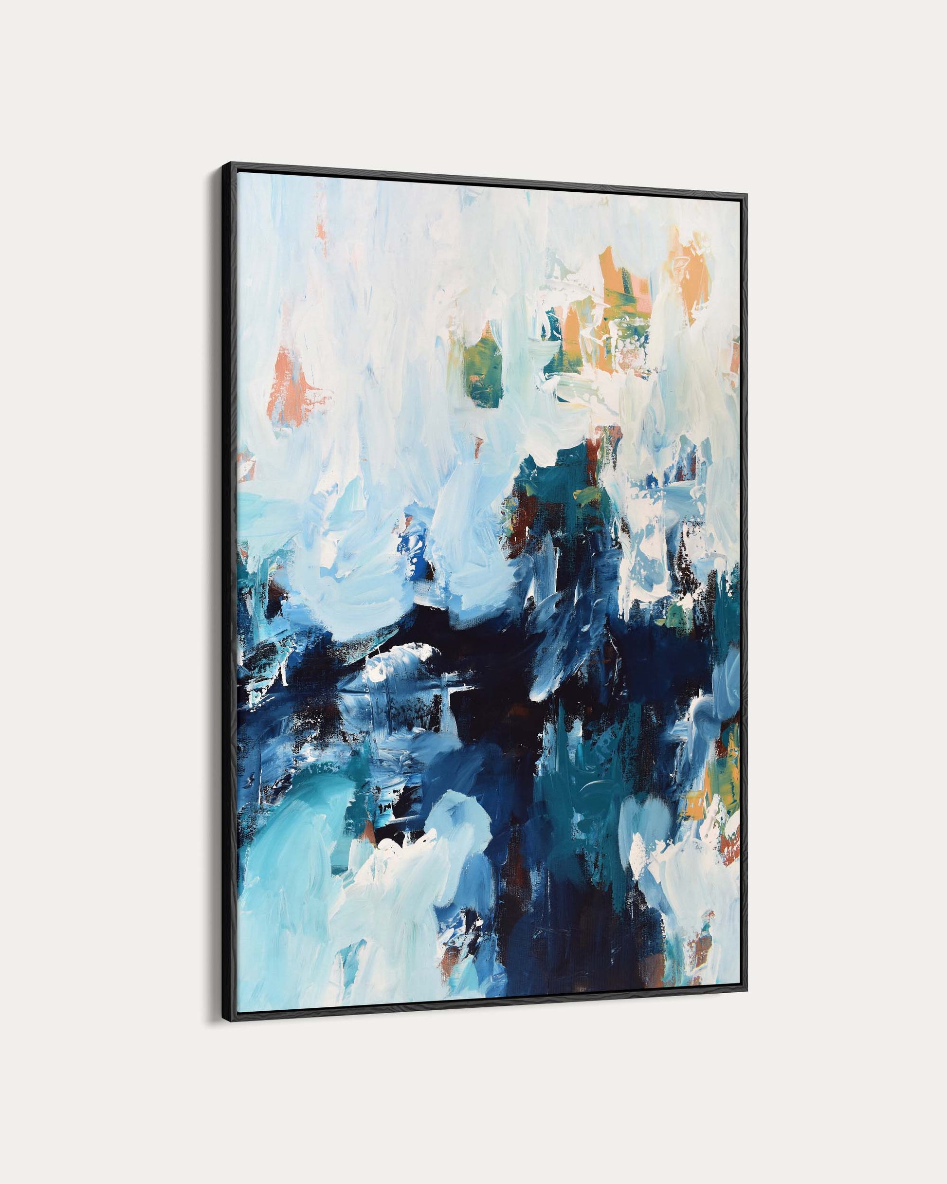 Framed abstract painting with blue and white tones on a light gray background