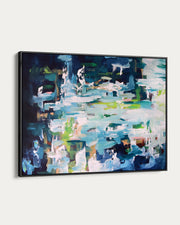 Framed abstract painting with a colorful palette on a white background