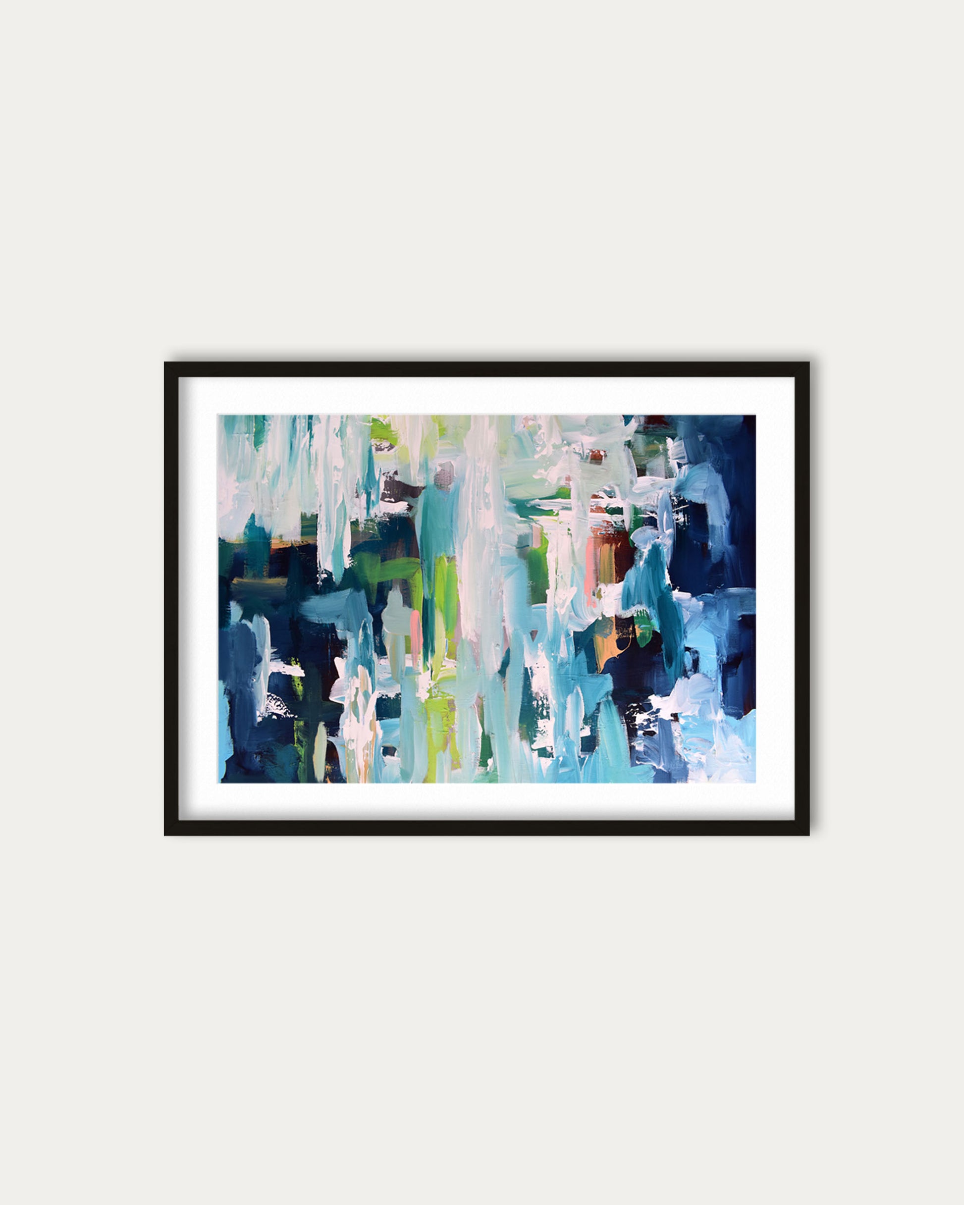 Framed abstract art print on a white wall