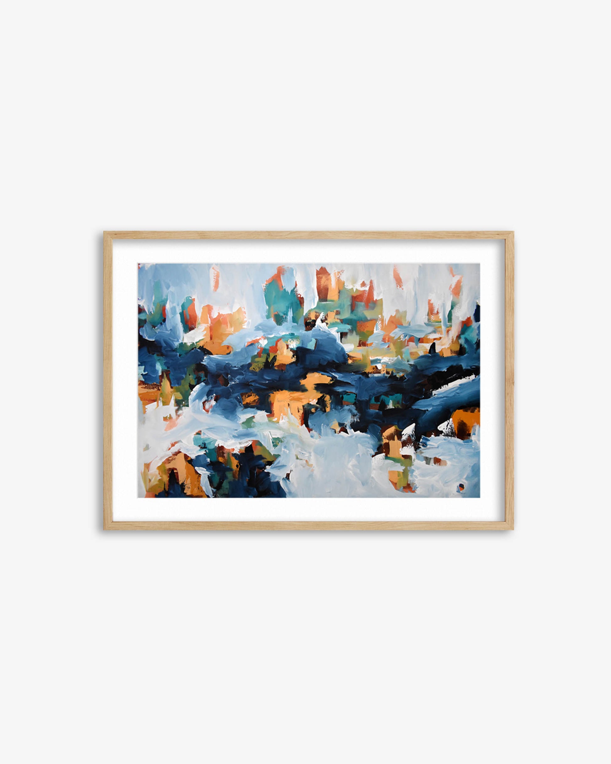 Framed abstract painting with blue, orange, and green colors on a white wall.