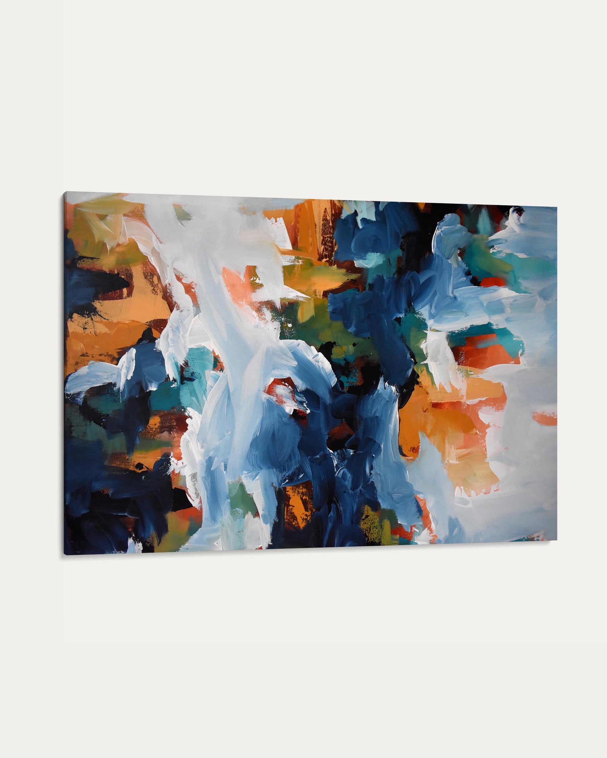 Abstract painting with a mix of blue, orange, and white on a white background