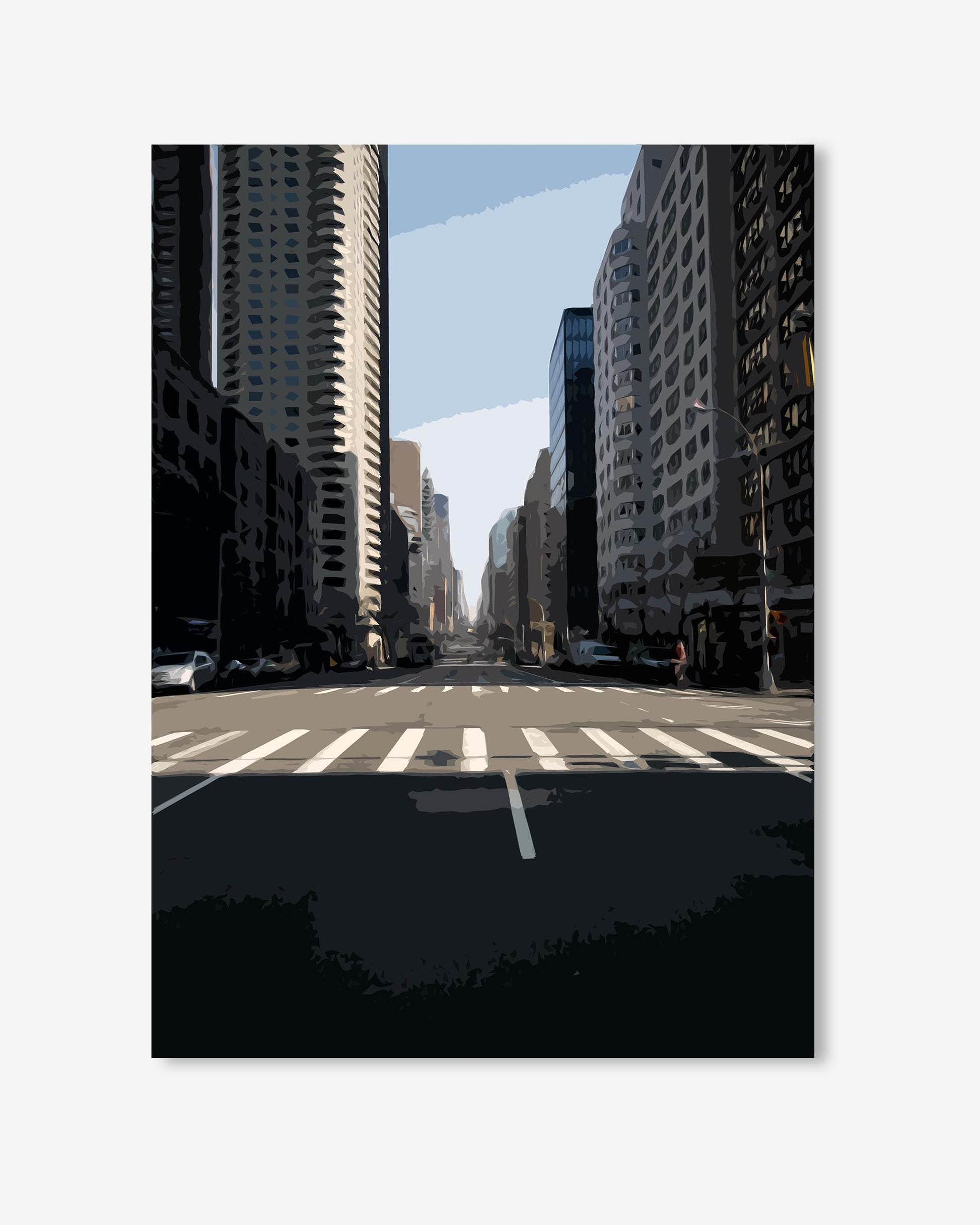 City street with tall buildings and a clear sky