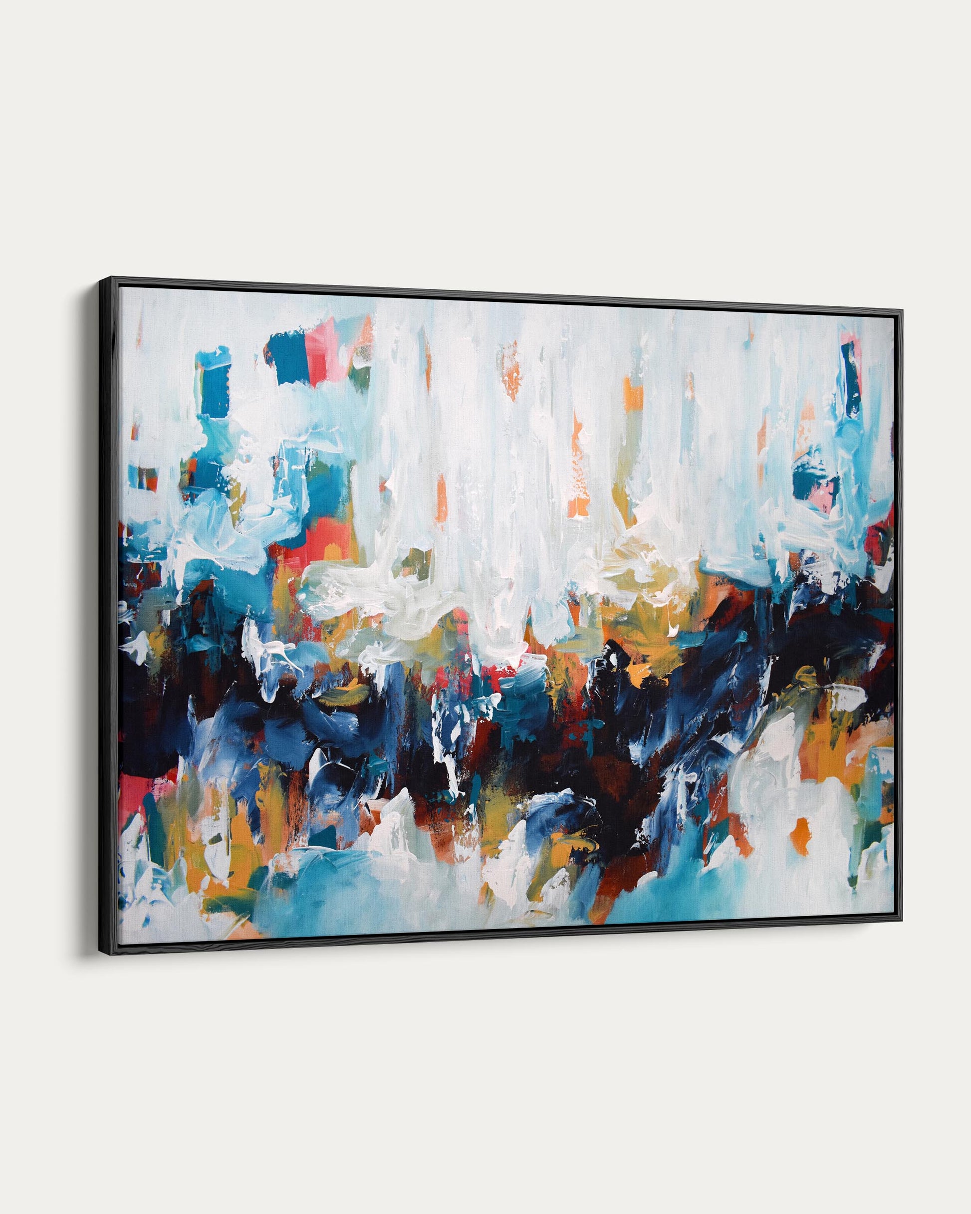 Abstract painting with colorful brush strokes on a white wall