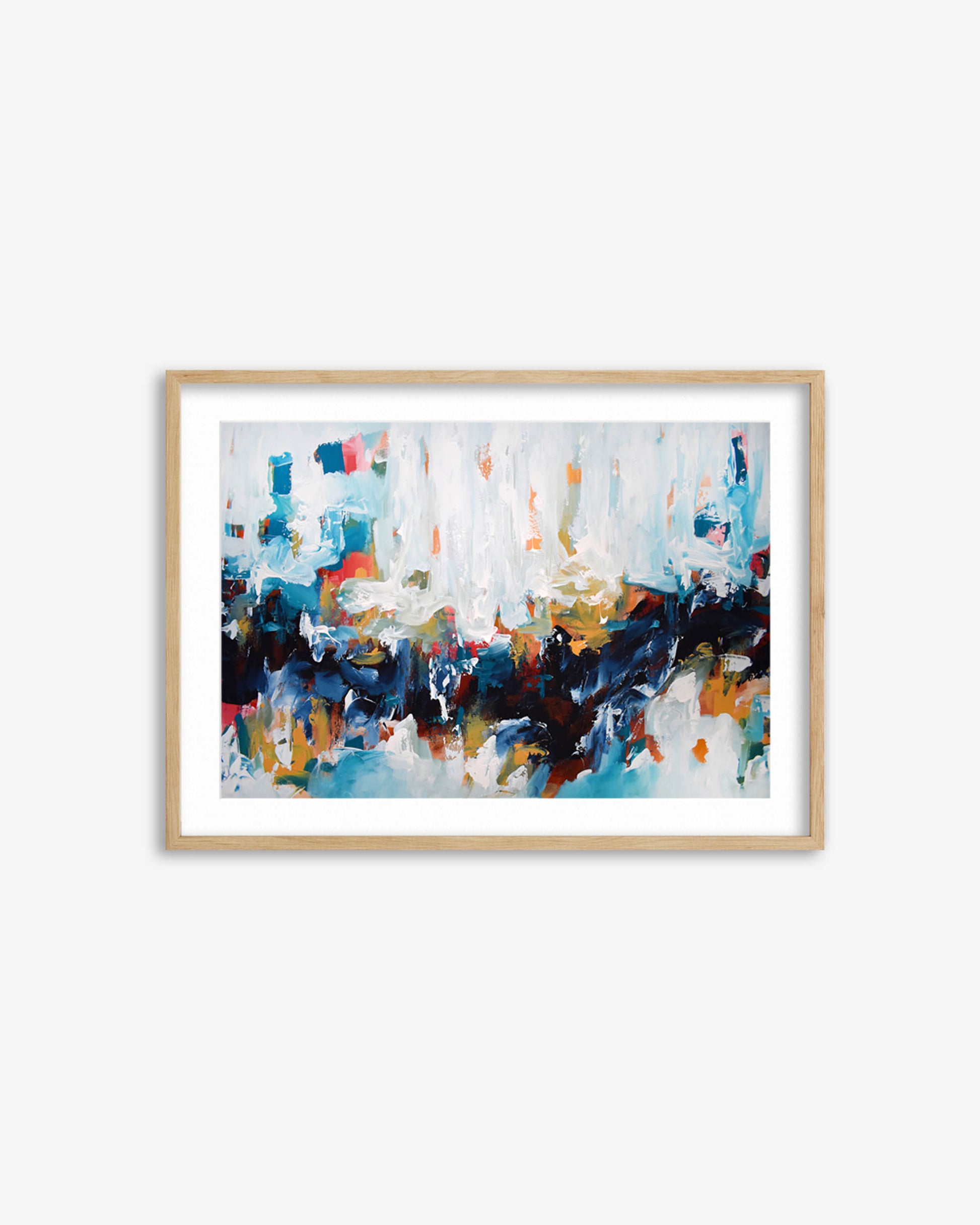 Framed abstract art print with colorful brush strokes on a white wall