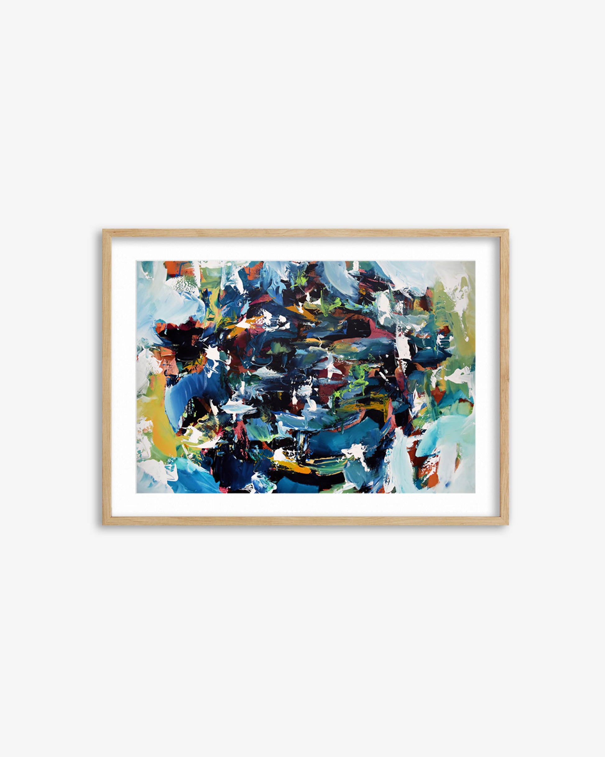 Framed abstract artwork with a colorful design on a white wall