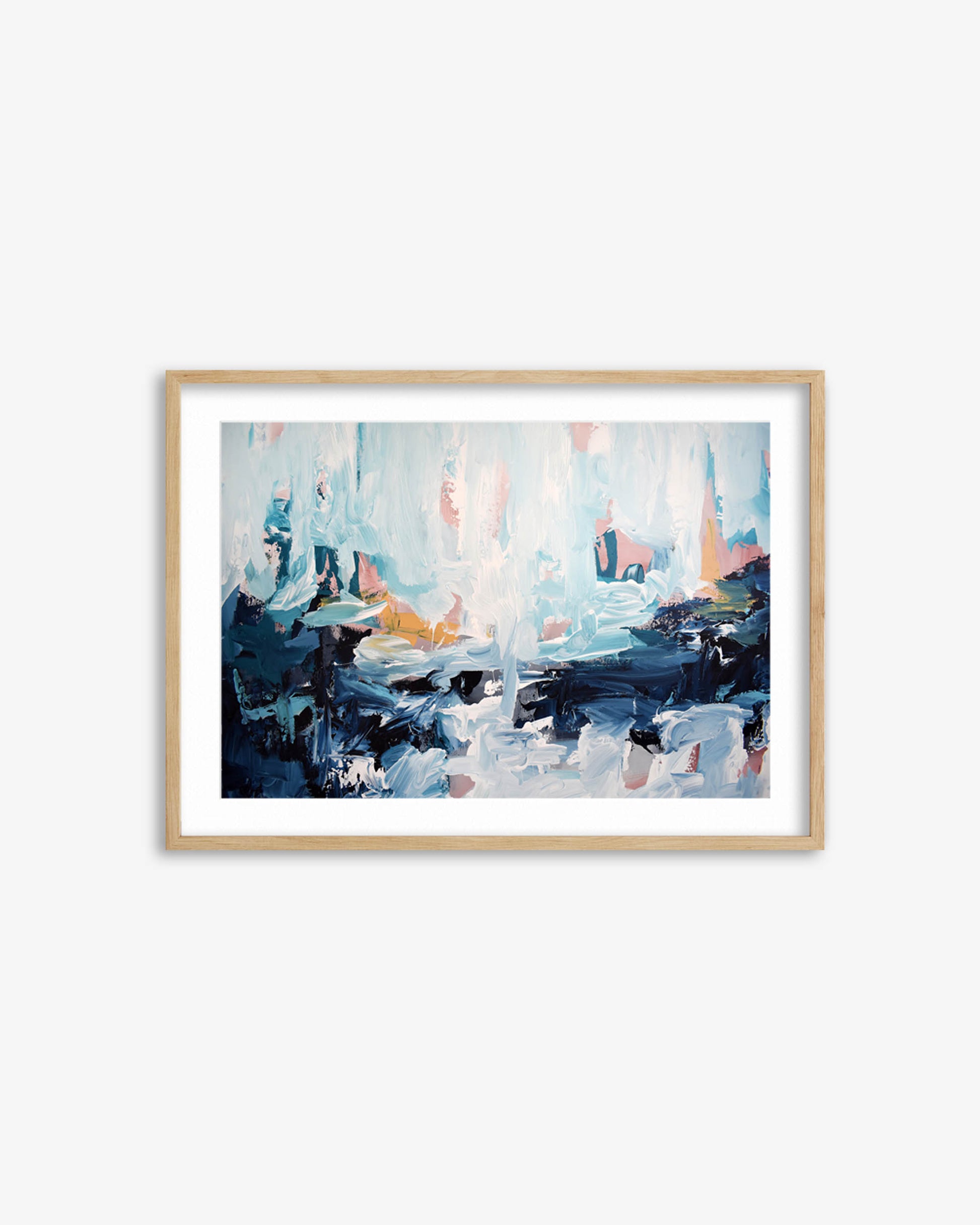 Framed abstract painting with blue and gray tones on a white wall
